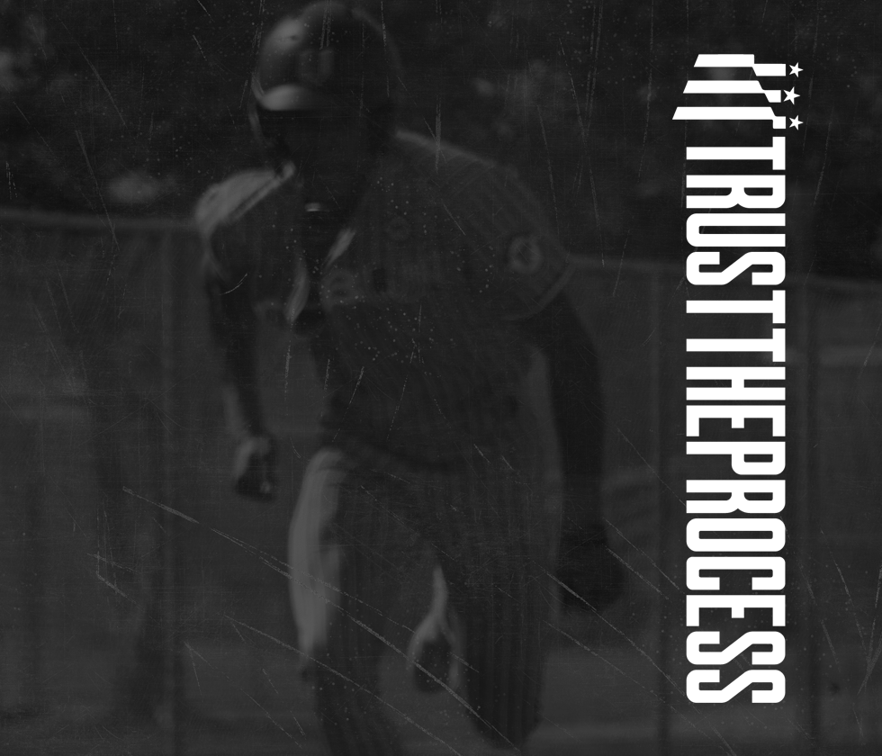 A person in a reflective jacket and helmet takes a selfie in front of a mirror, with the text 'It Truss The Process' in bold white letters on the right side of the image.