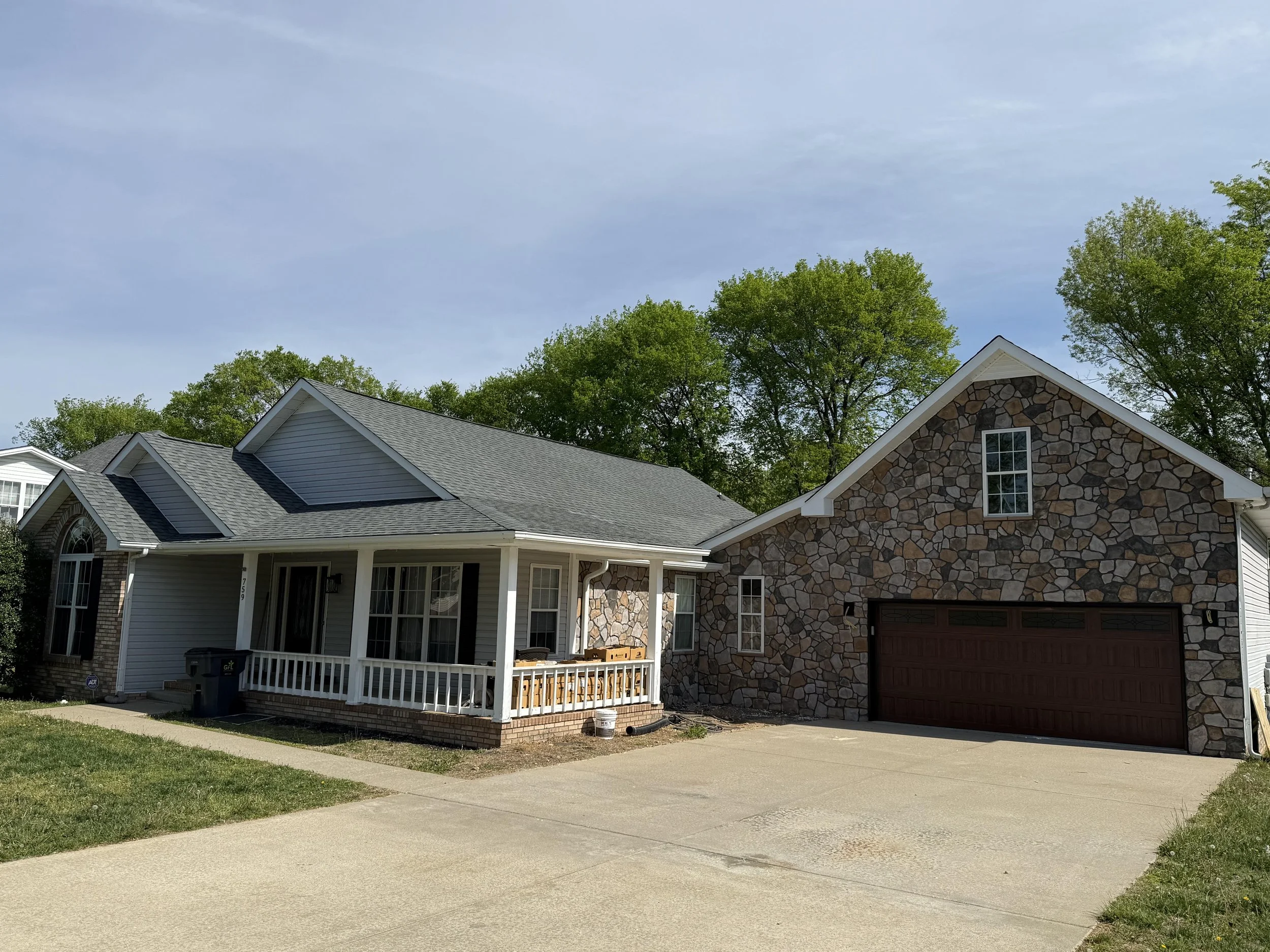 Rock face vinyl siding installation completed by Lil Fellers LLC, a veteran owned siding contractor serving Clarksville, Montgomery County, and Middle Tennessee.