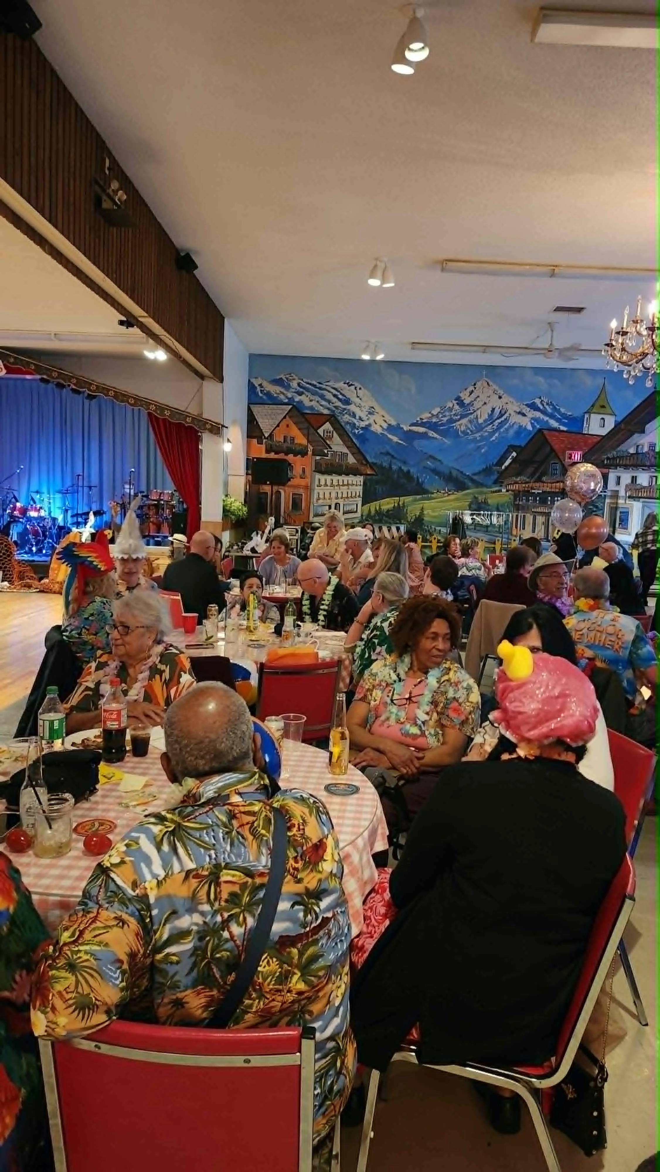 Audience dressed colourfully for a performance by the Volcano Band at the Austria Club (Margaritaville Party)