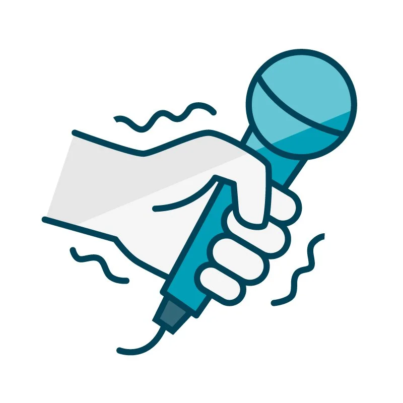 Trembling hand holding a microphone