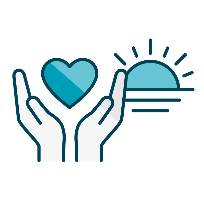 Two hands with a heart and sunset in the background