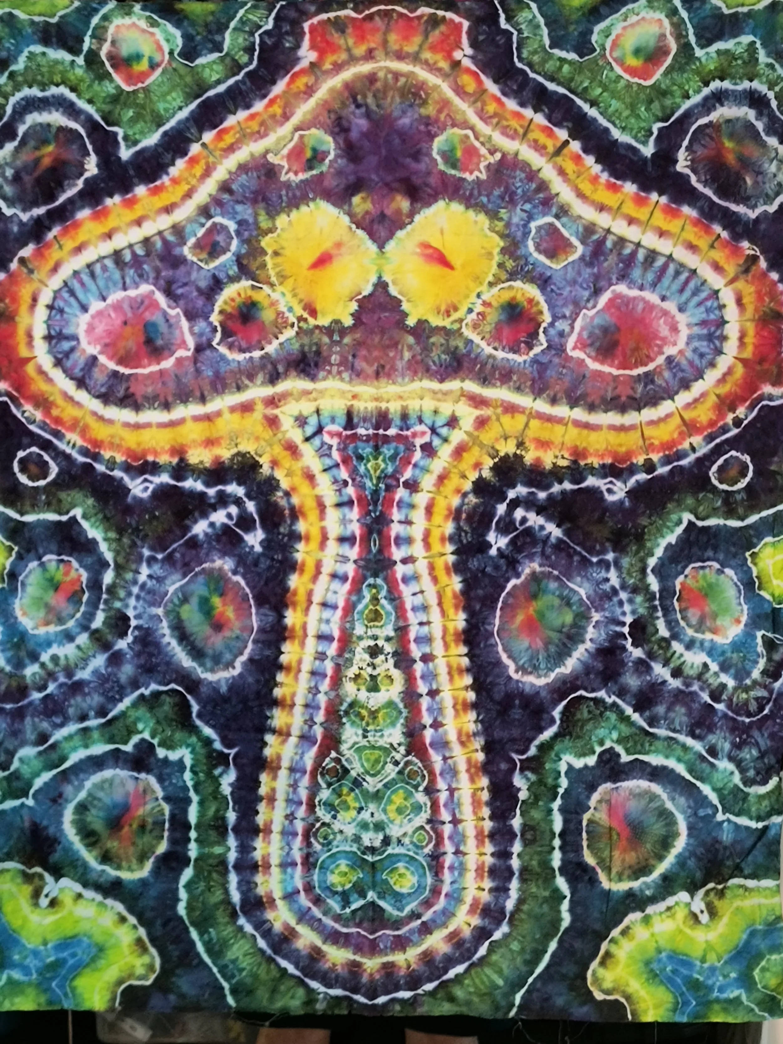 Psychedelic tie-dye mushroom pattern with vibrant colors!