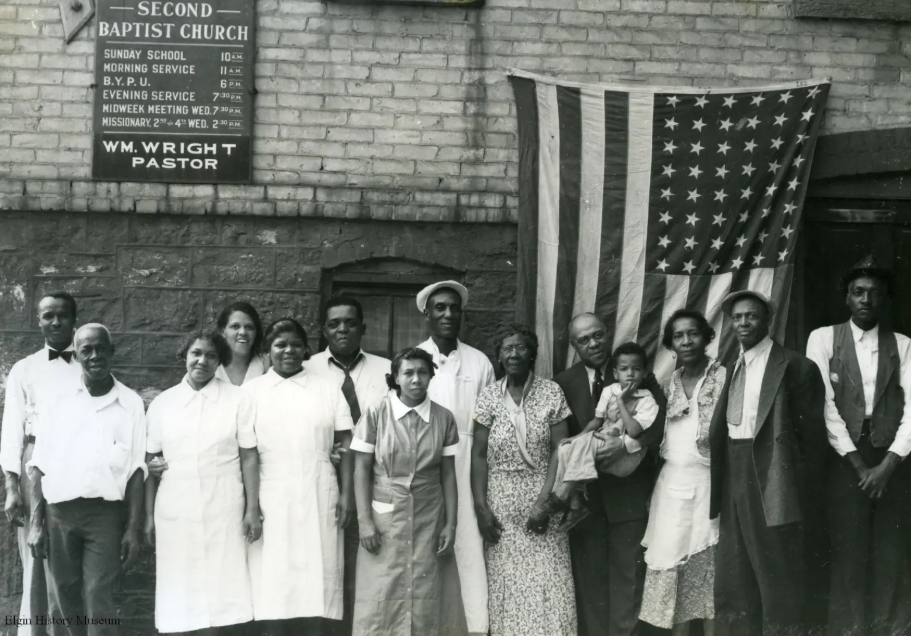 Group standing in front of Elgin's Second Baptist Church