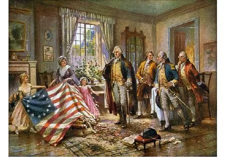 An oil painting depicting Betsy Ross presenting the first American flag to George Washing and two other officers in a colonial-style room. Ross and two young girls are draped in the flag on the left, while Washington stands centrally.