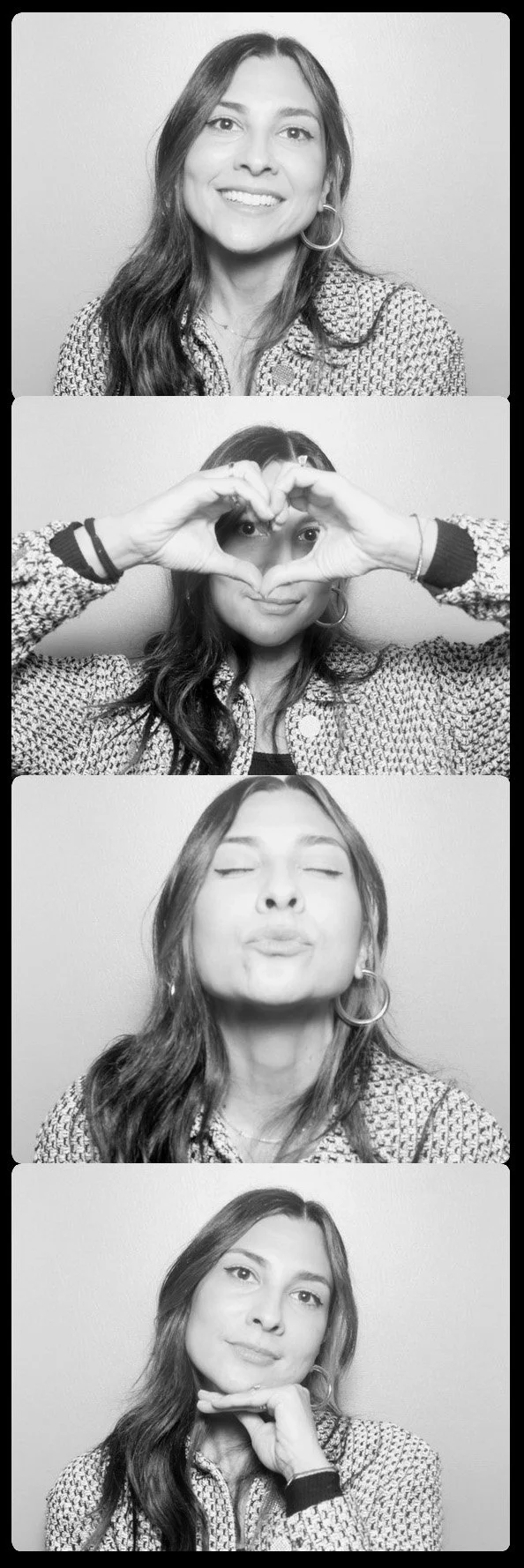A four-frame black-and-white photo strip of a woman with long hair, wearing a patterned jacket and hoop earrings, making different expressions and gestures, including forming a heart shape with her hands.