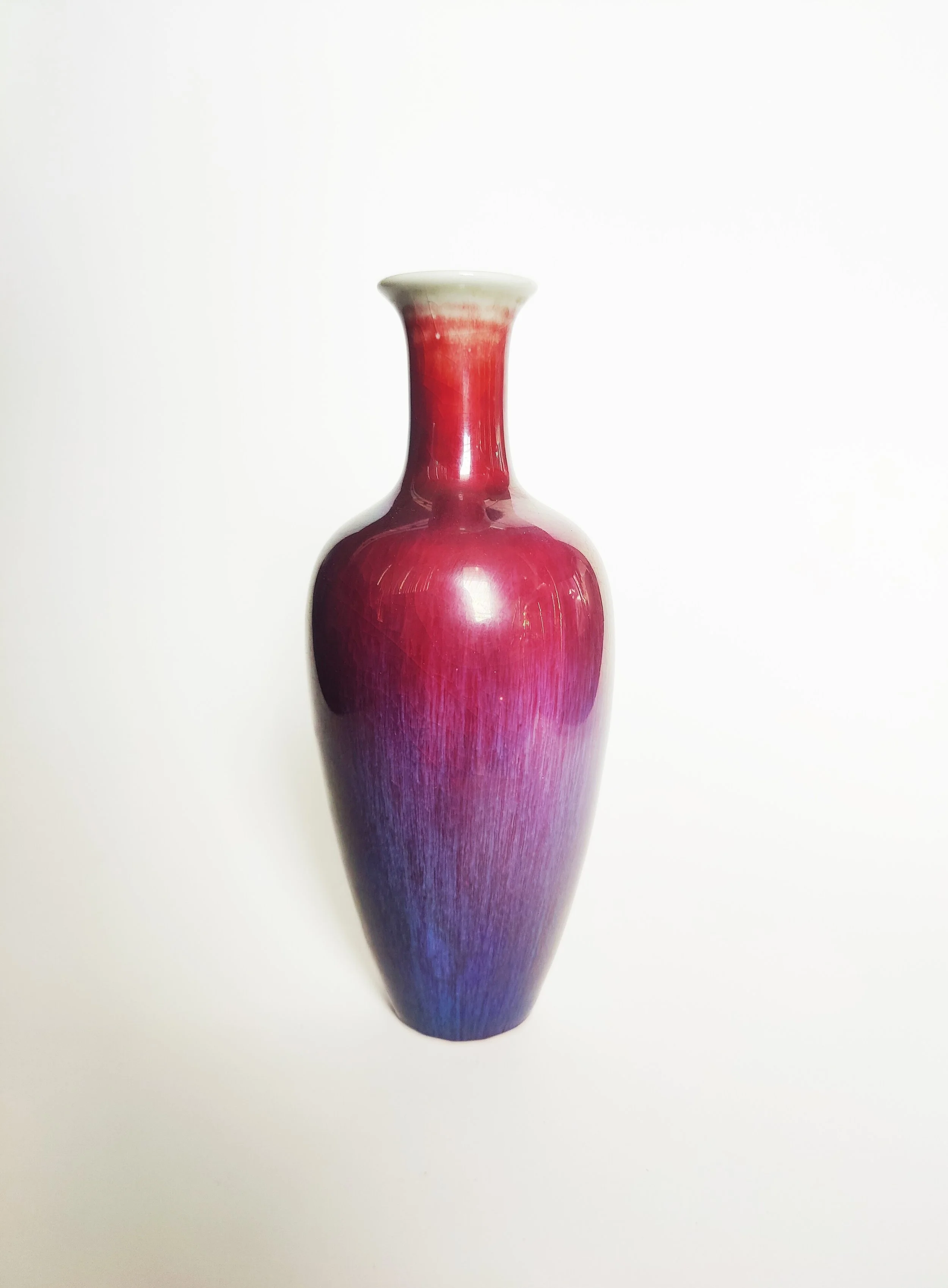 A Chinese Porcelain Flambé-Glazed Vase in Oxblood and Purple, with Kangxi Reign Mark