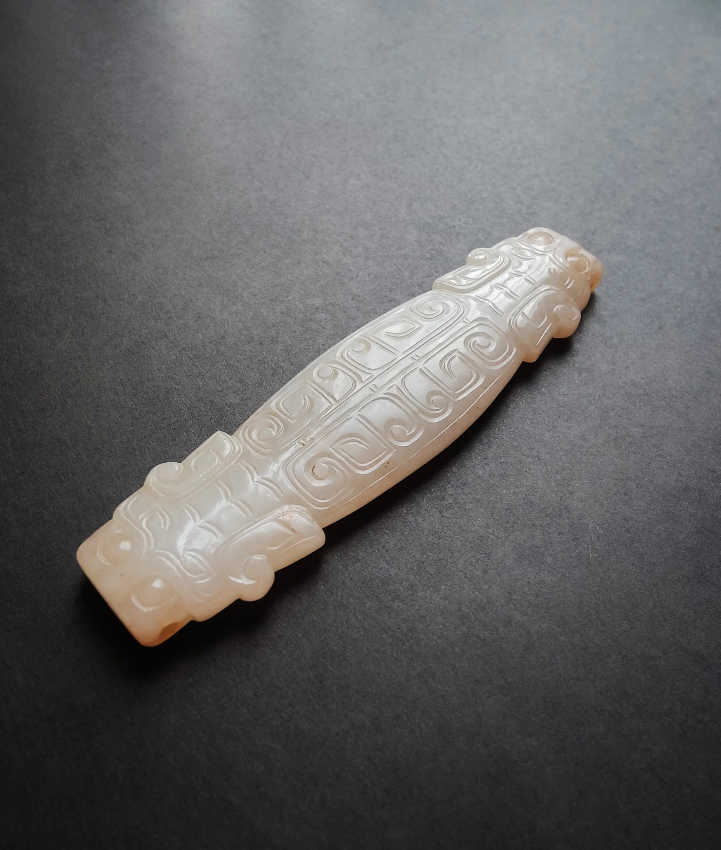 A Chinese White Jade Chilong Dragon Pendant