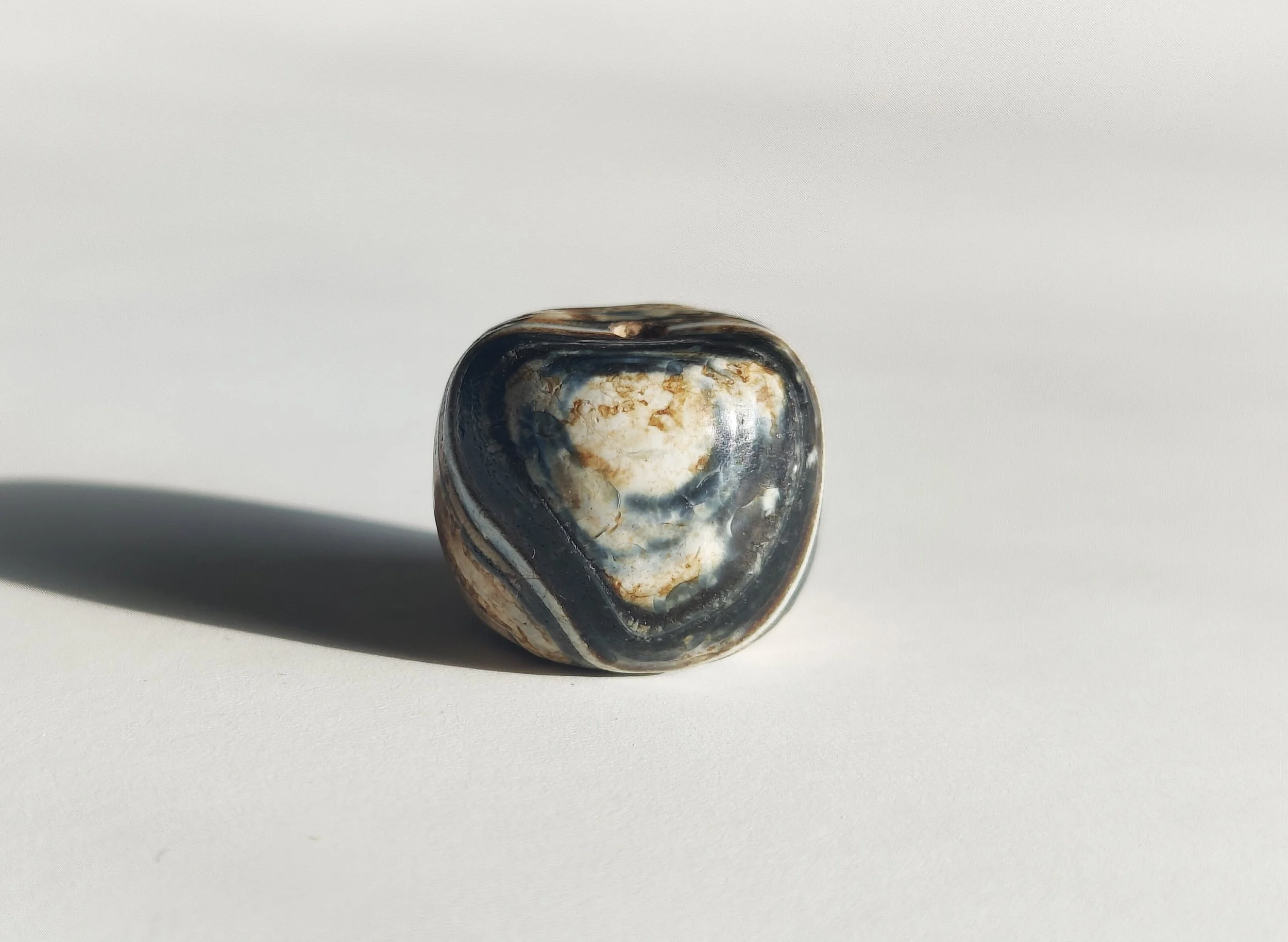 A Tibetan Rounded Dzi Bead in Banded Agate – Himalayan Region