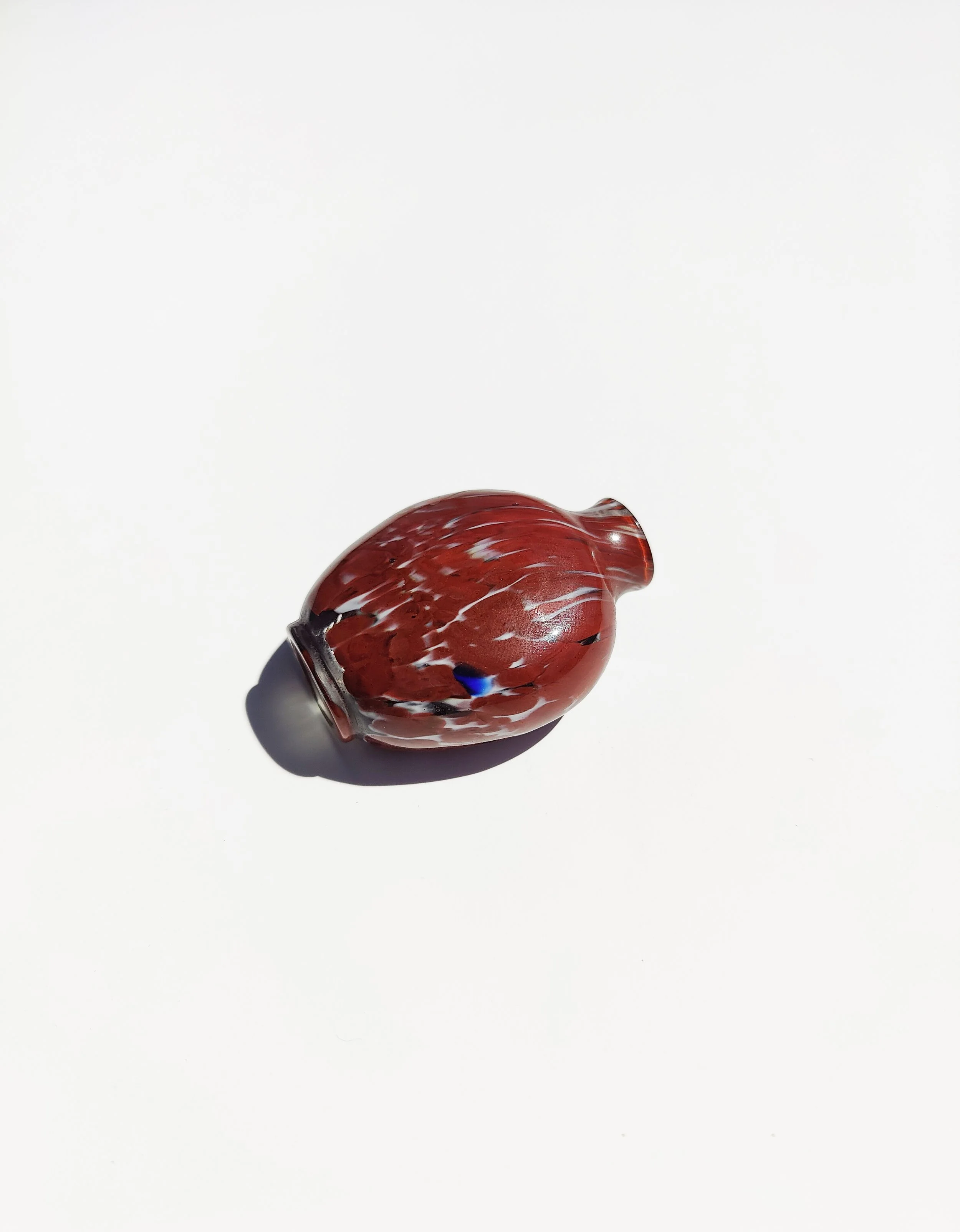 A Chinese Red Swirled Peking Glass Snuff Bottle