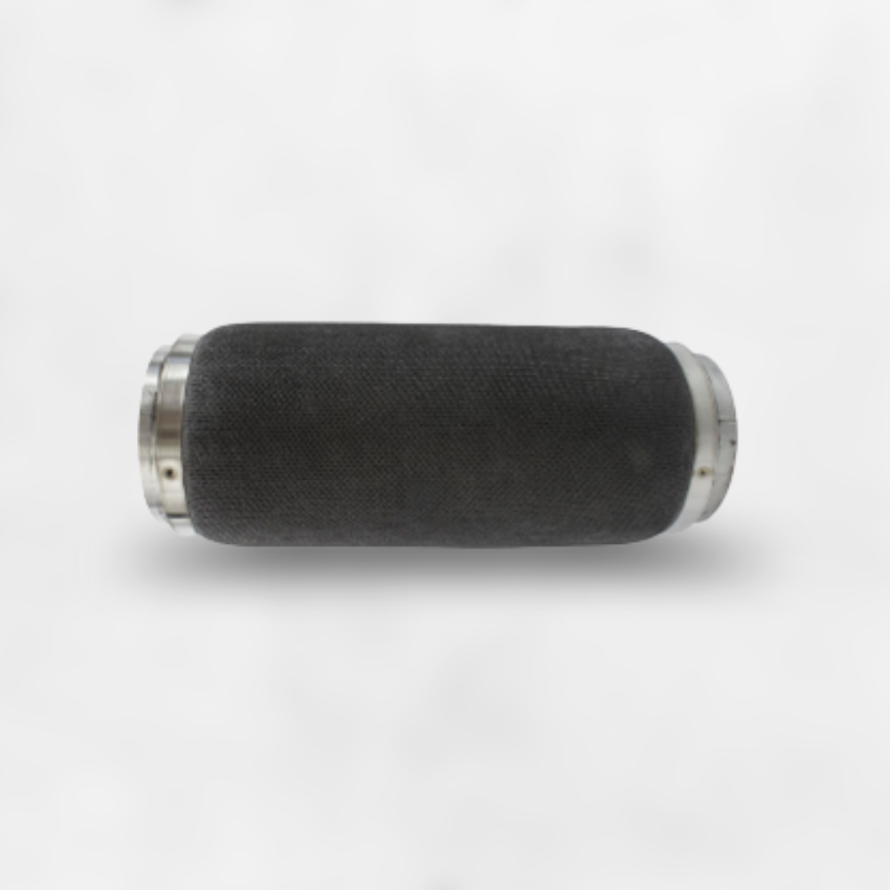 A black cylindrical microphone with metal ends, lying horizontally on a white surface.