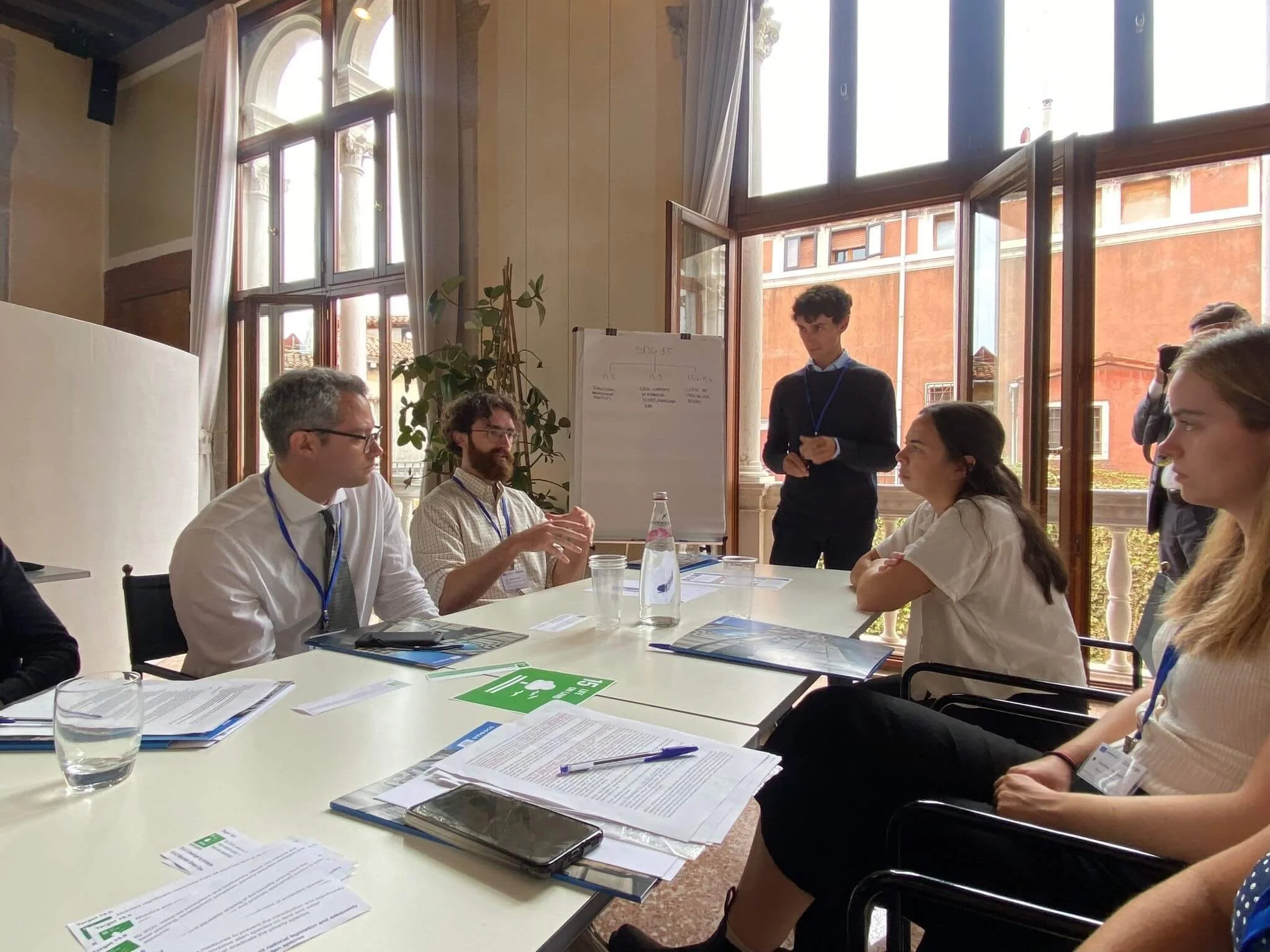 biosphere-team-discussing-sdg-15-life-on-land-with-team-at-conference.jpg