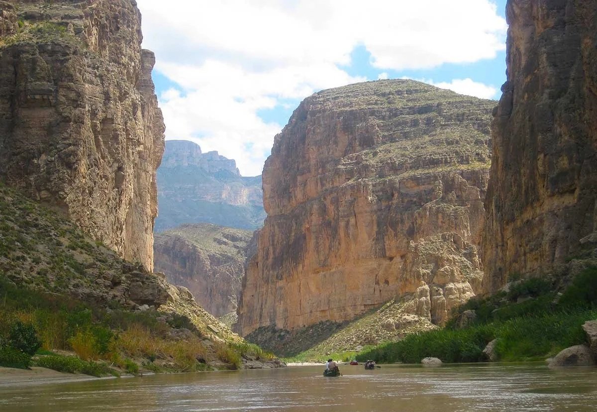 Visitors canoeing through Boquillas Canyon in Texas's Big Bend Biosphere Region.
