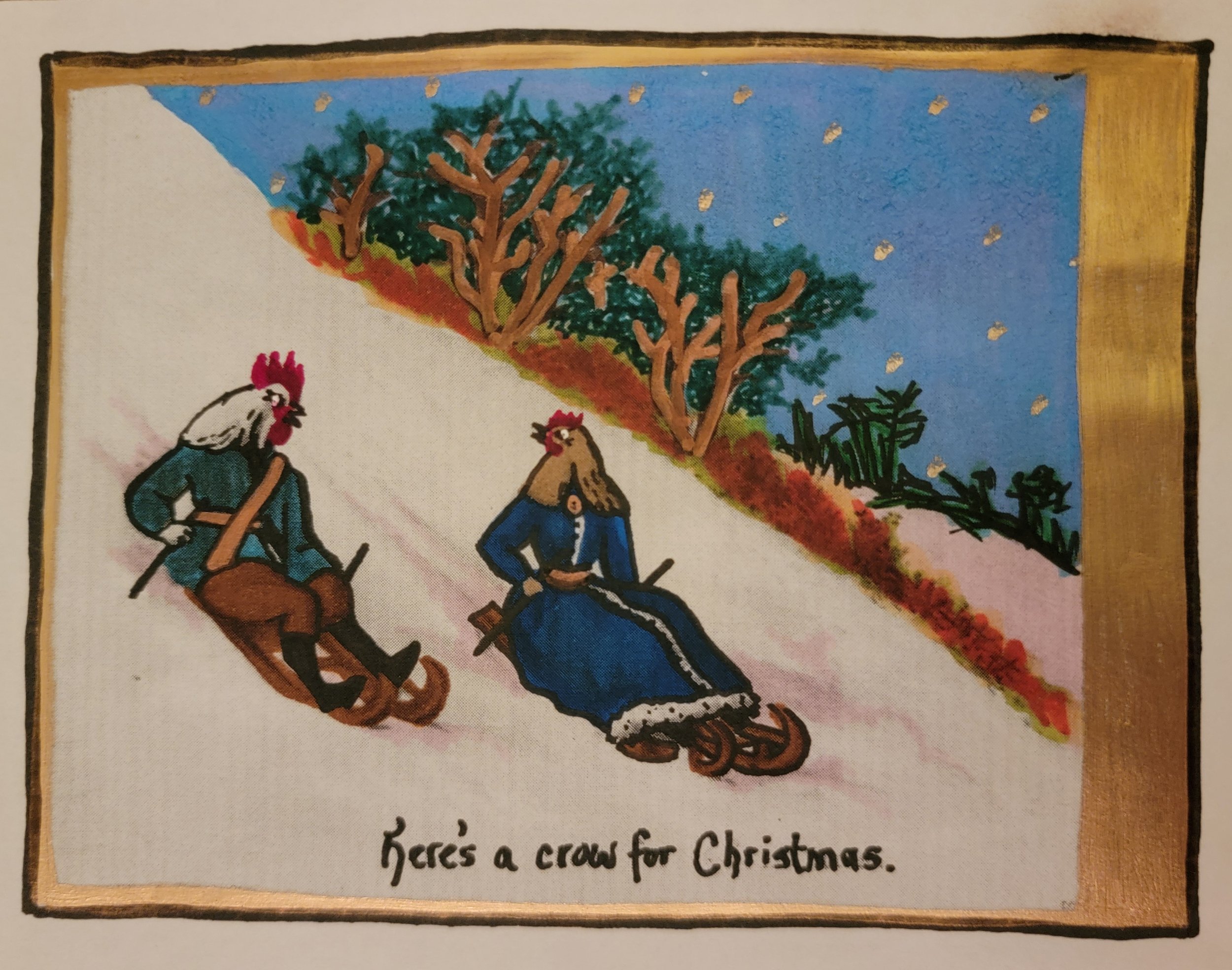 Colorful drawing of two roosters riding skis down a snowy hill with trees and stars in the background. The caption reads, 'Here's a crowd for Christmas.'