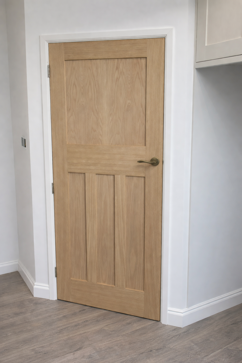 New oak panel door in hallway.png