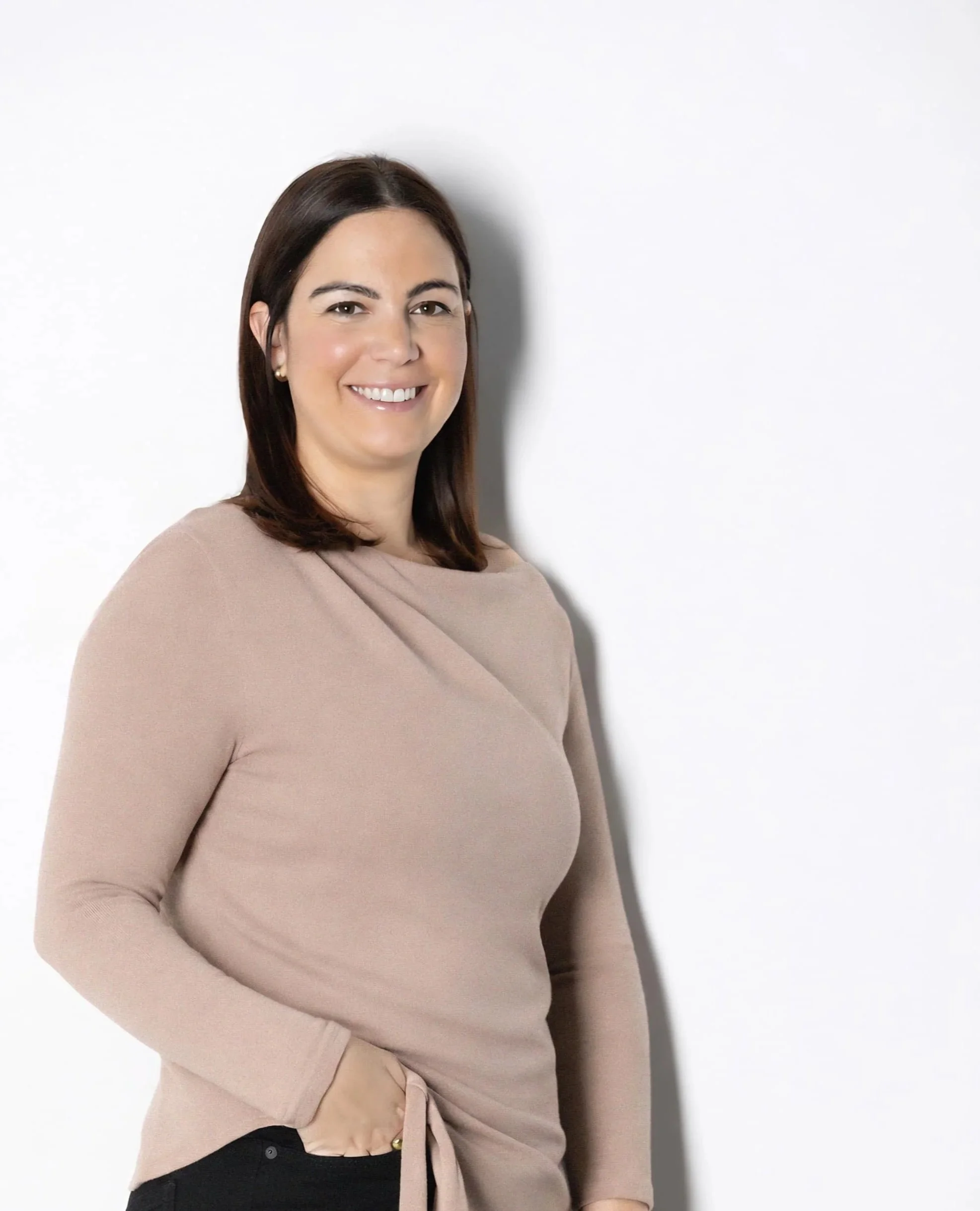 Hayley Gray standing with her hand in her pocket