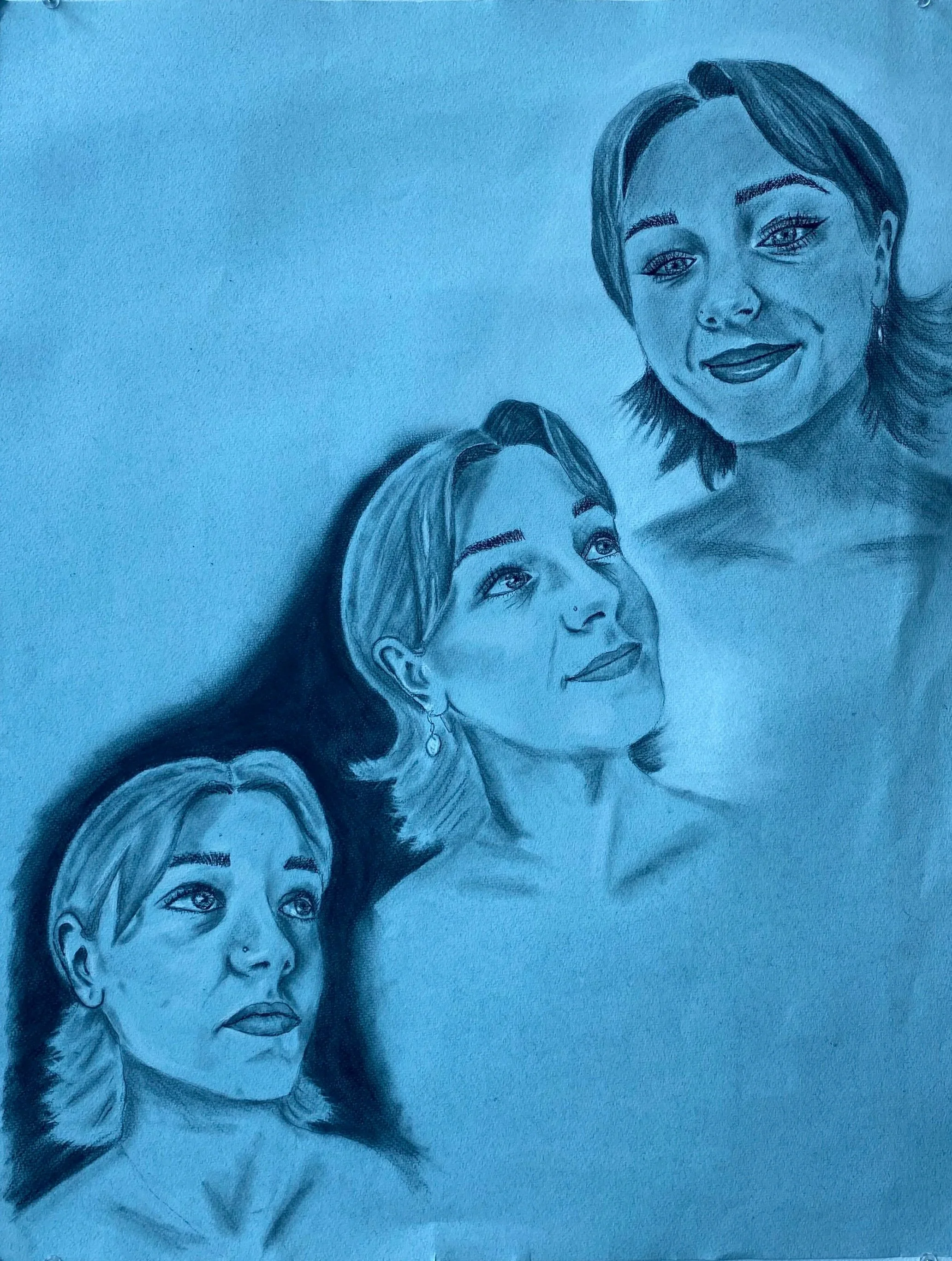 A pencil sketch of three women with different expressions, all looking upwards. The background has a light blue tint.