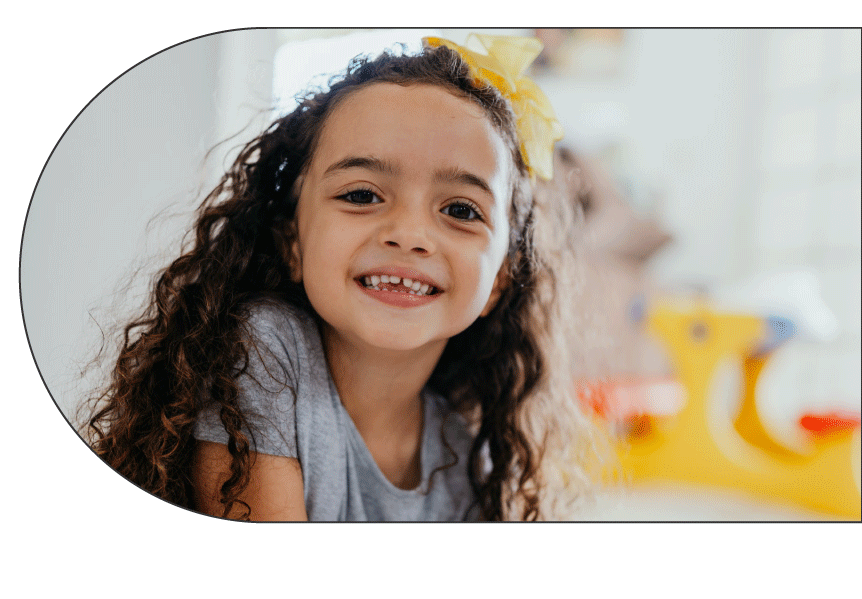 Little girl smiling with missing tooth