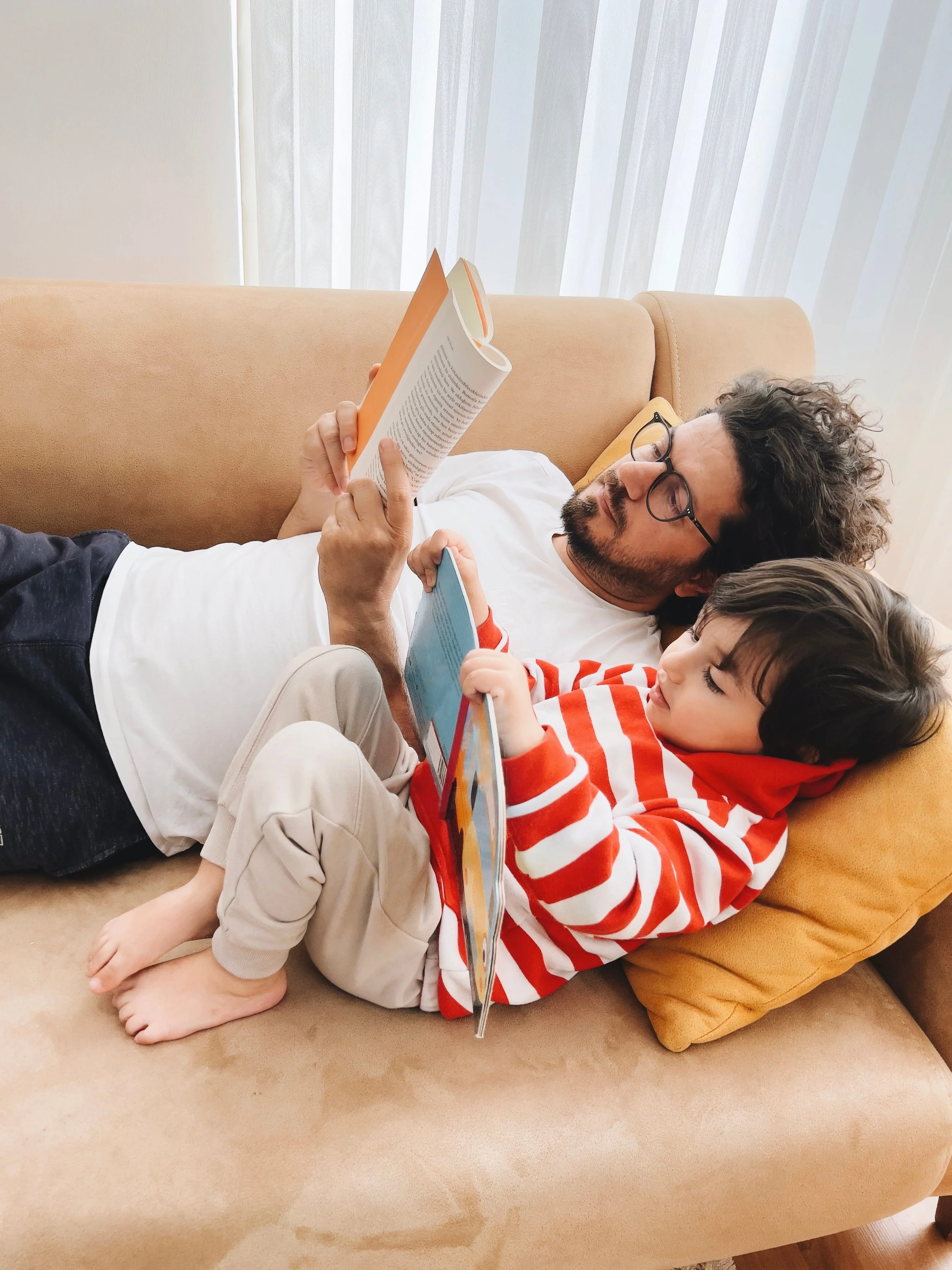 dad and son reading books