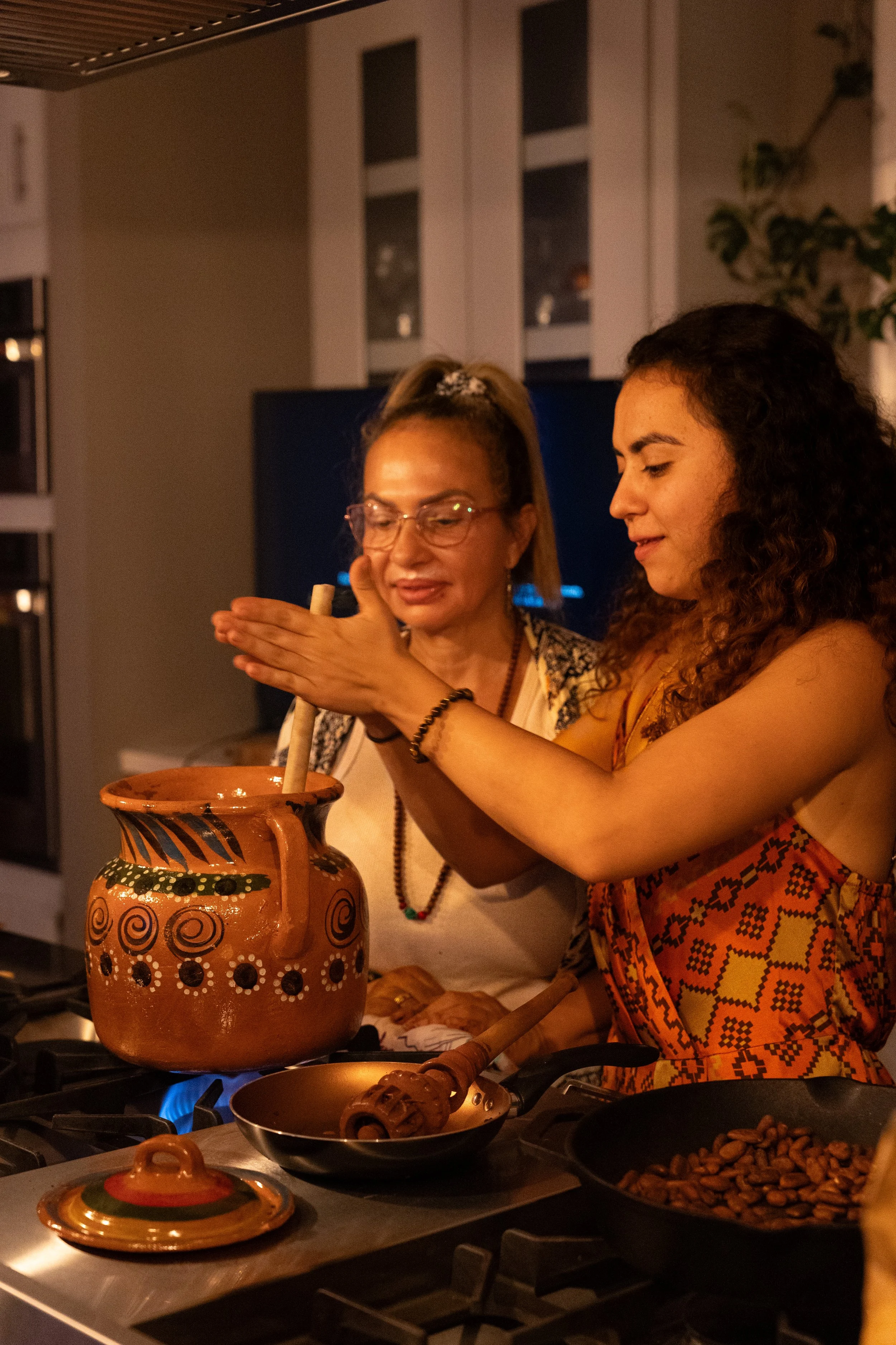 Ceremonial cacao preparation at immersive music creation retreat hosted by Delady DJ and The Love Faery.