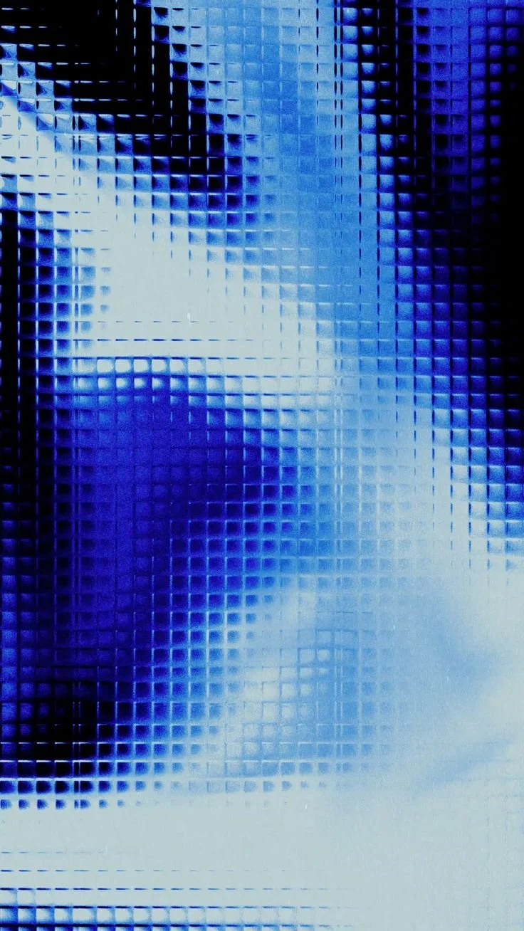 Abstract image of a textured blue glass surface with light reflections