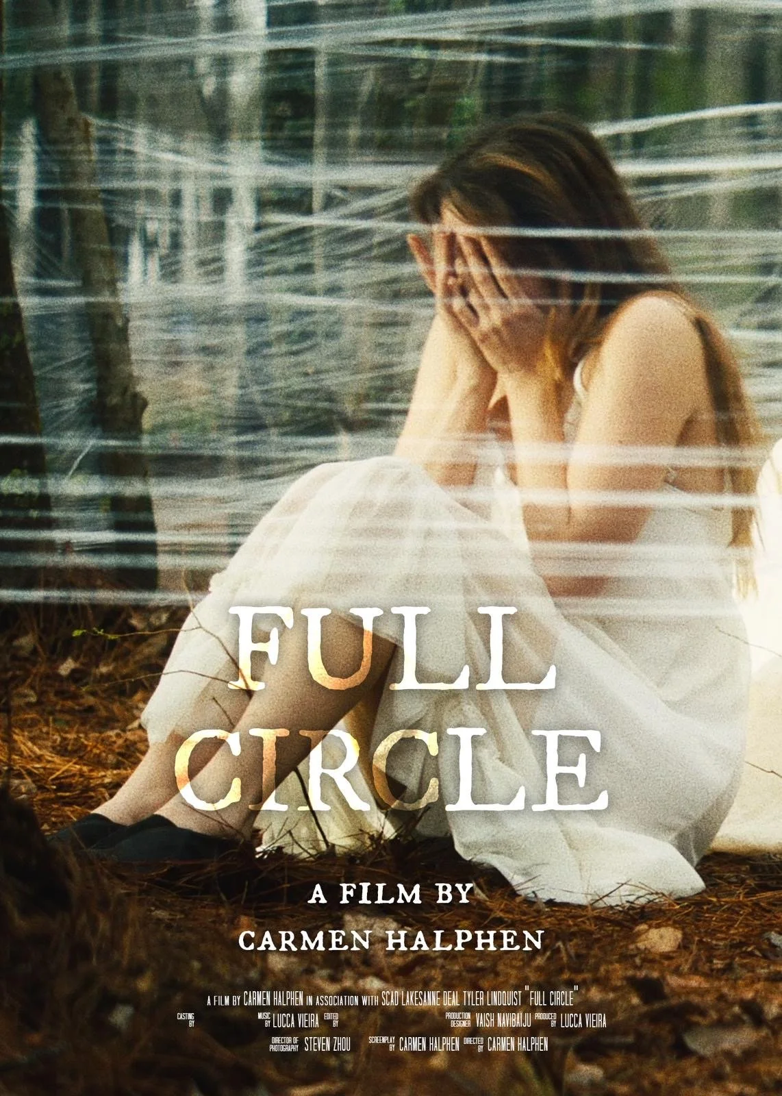 A promotional poster for the film 'Full Circle' directed by Carmen Halphen, showing a woman sitting on the ground with her hands over her face, covered by plastic wrap, in a wooded outdoor setting. The poster lists the cast, crew, and title.