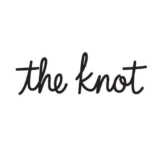 Text reading 'the knot' in black cursive font on a white background.