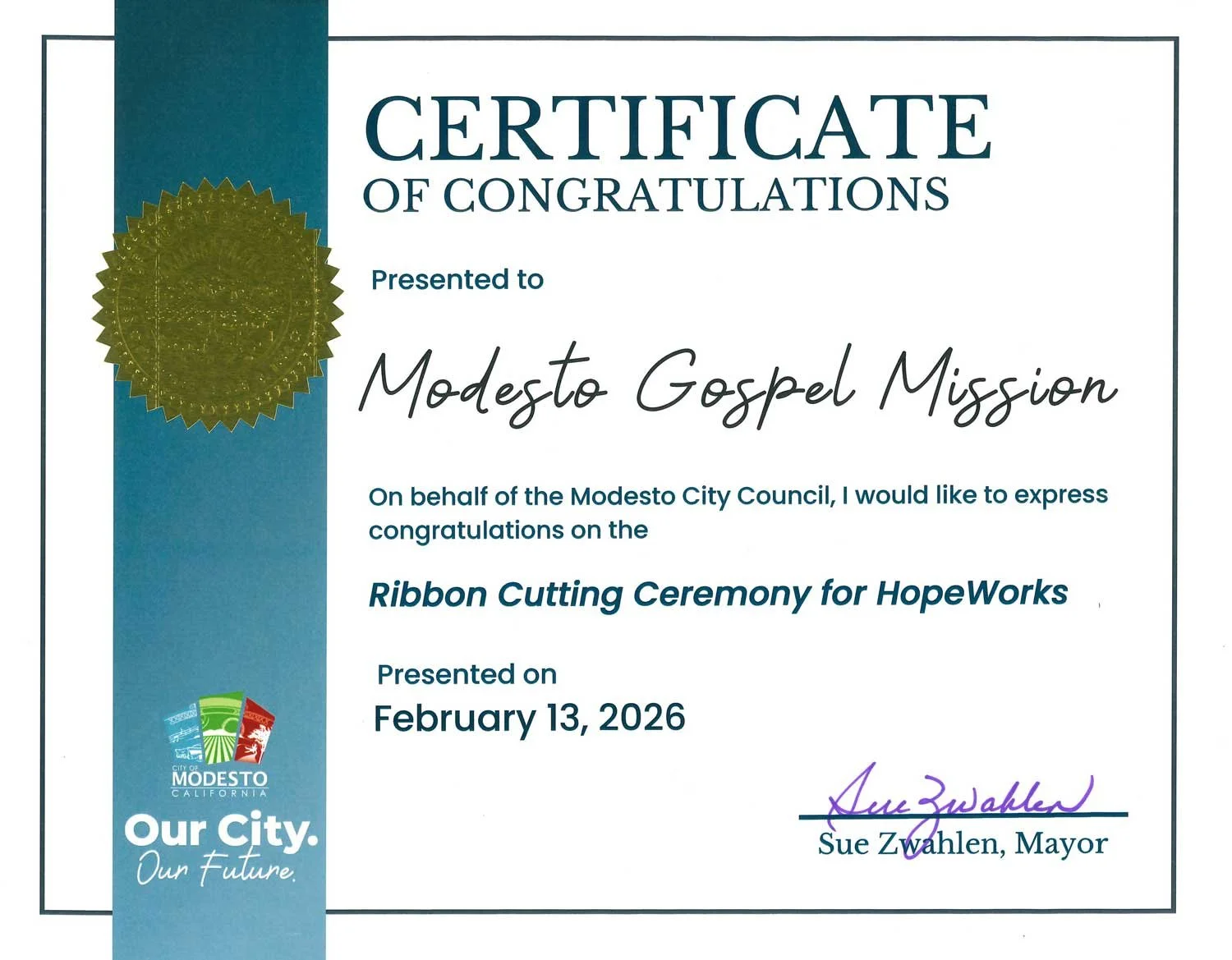 Certificate of congratulations awarded to Modesto Gospel Mission for participating in the ribbon cutting ceremony for HopeWorks, presented on February 13, 2026, signed by Mayor Sue Zwahlen.