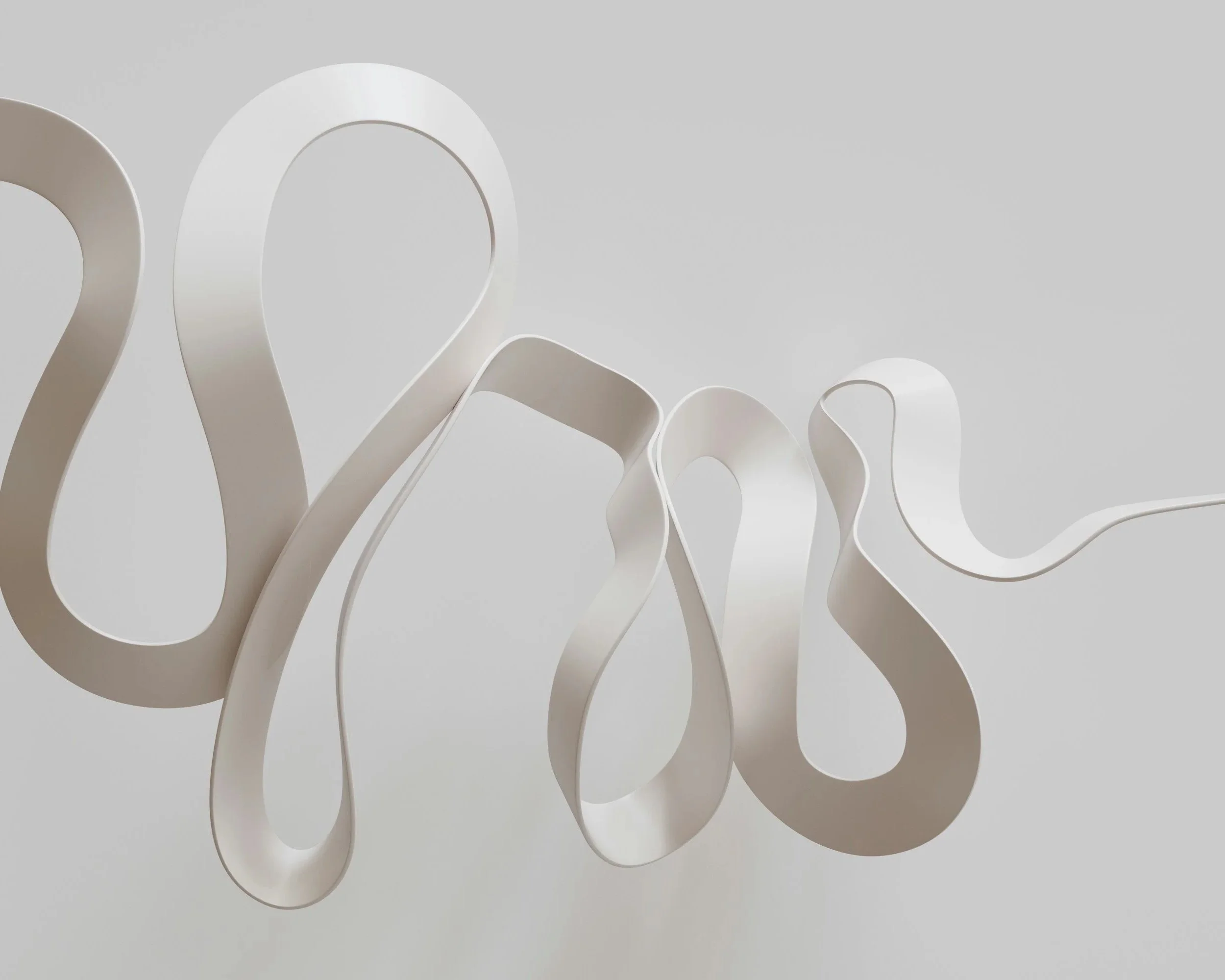 Abstract white sculptural artwork with flowing, looped forms against a light background. Content creation, connection, audience.