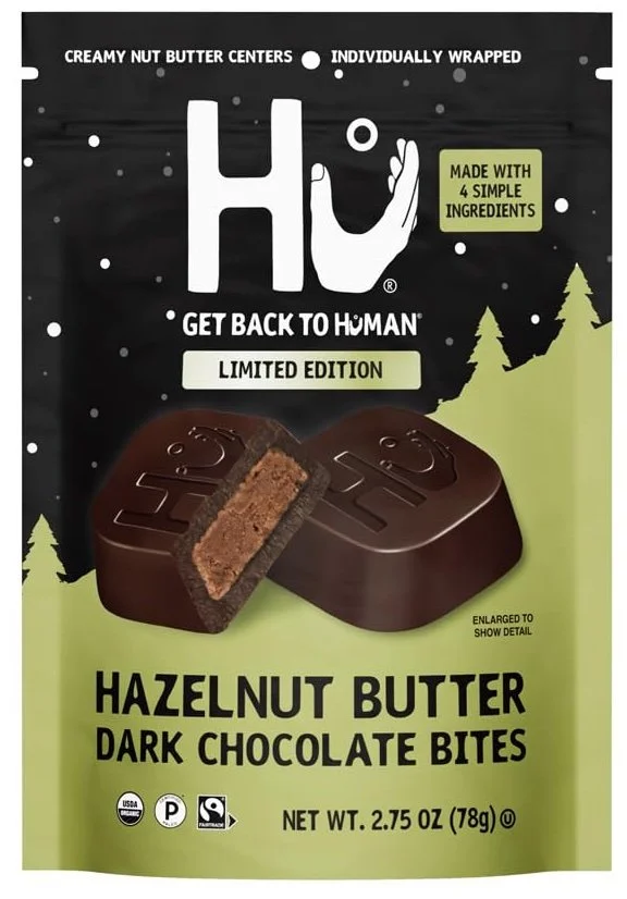 Bag of Hu Kitchen Hazelnut Butter Dark Chocolate Bites, paleo-friendly dark chocolate filled with hazelnut butter.