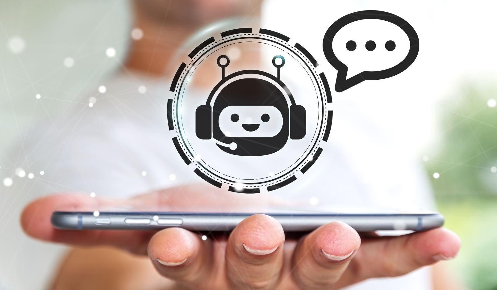 Hand holding a smartphone displaying a friendly chatbot icon, representing a gut health concierge AI.