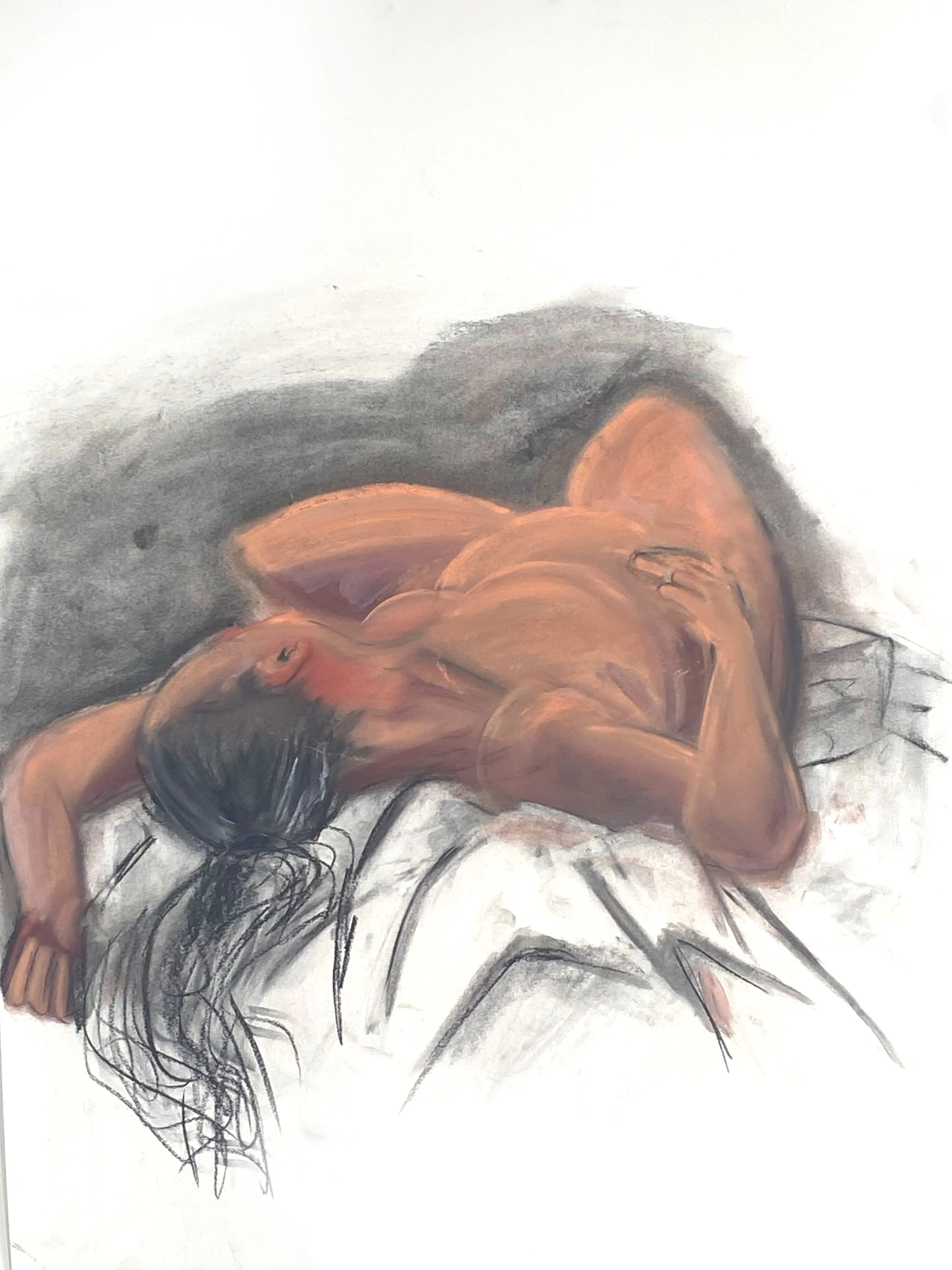 A painting of a nude woman lying on her side on a bed, with her hair spread out and one arm draped over her head.