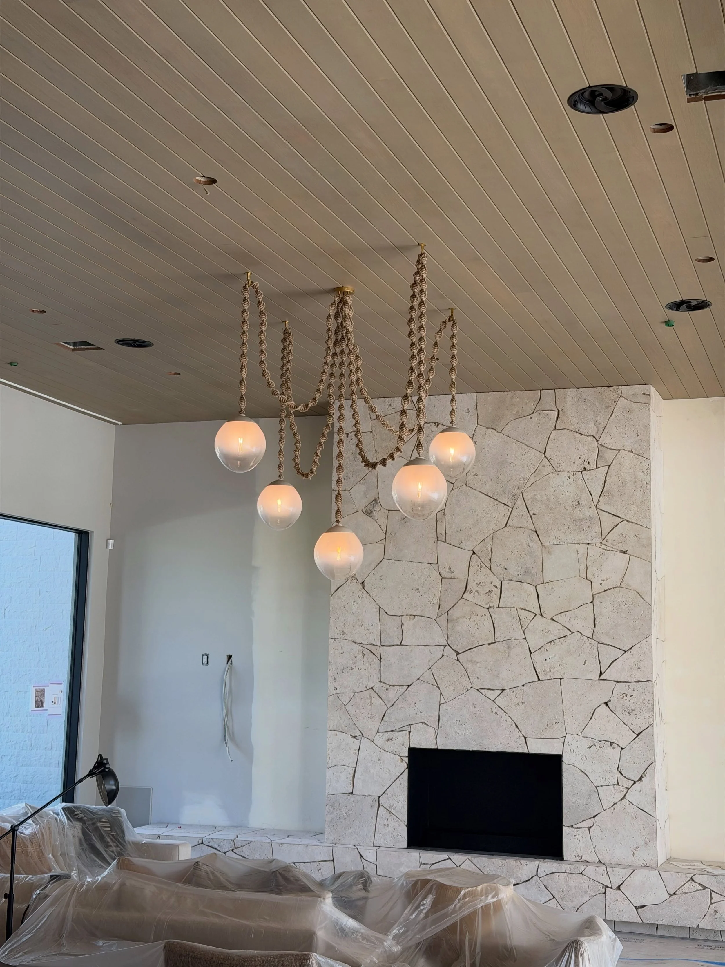 From construction zone to almost move-in ready. ✨ The fireplace is finished, the Brightbound fixture is up, and today&rsquo;s the final clean before our clients get to call this place home. So happy for them!