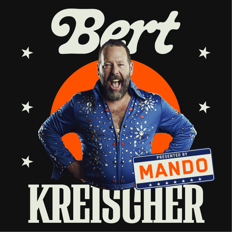 A man wearing a blue, rhinestone-studded Elvis Presley-style jumpsuit, standing with hands on hips, smiling with mouth open in front of a black background with white stars and a red circle behind his head, with the words 'Bert Kresisher' in white at the top and bottom.