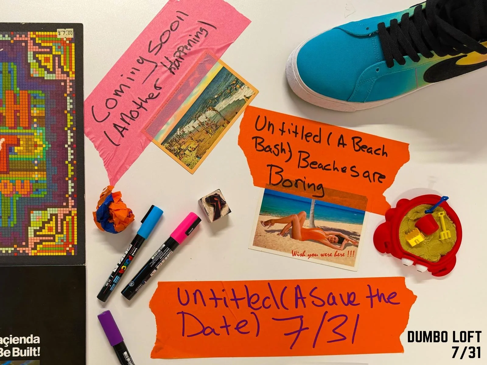 A white table with colorful handwritten notes, photos, markers, a toy, and a sneaker. One note says, "Coming Soon! (Another) Harpaling". Another note says, "Unfit/ed (A Beach Bash) Beaches are Boring." A postcard with a woman on the beach is also visible. There is a pixel art poster on the left and a toy sandcastle with shovels on the right. The bottom right corner shows text that reads "DUMBO LOFT 7/31."
