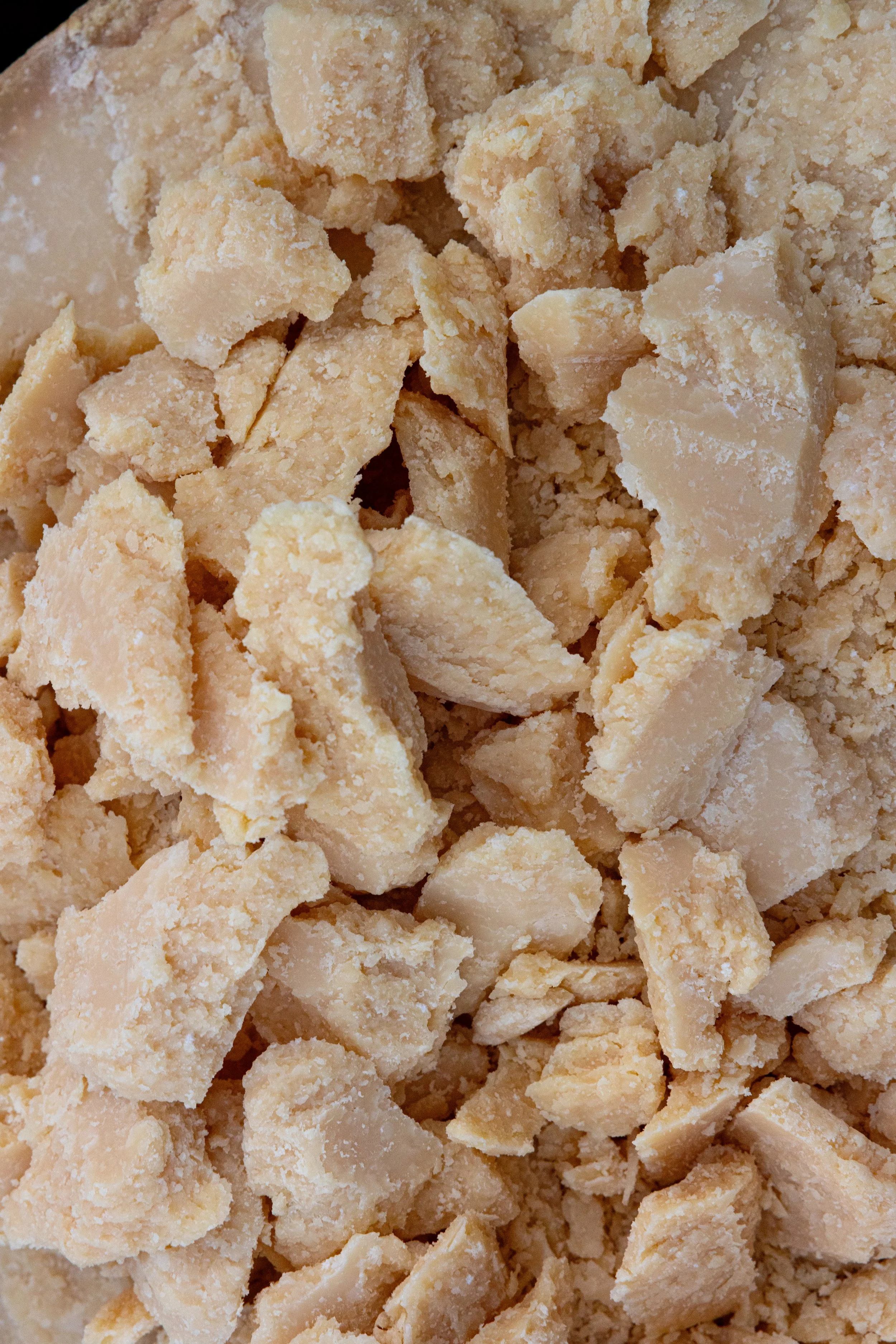 Chunks of parmesan cheese at an event catered by Roscioli.