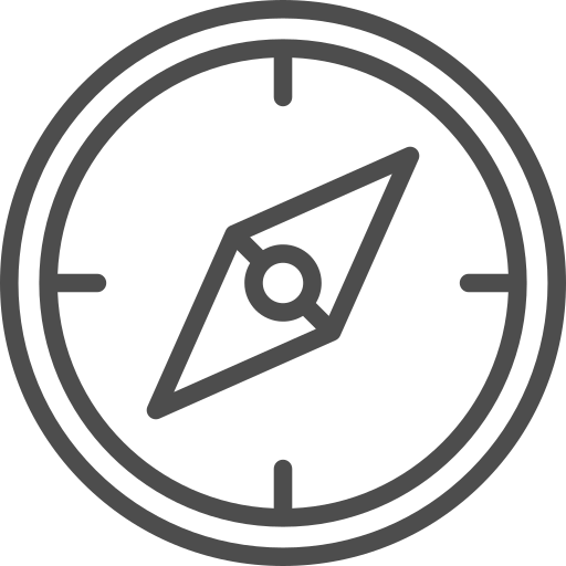 A black and gray compass with directional markings.