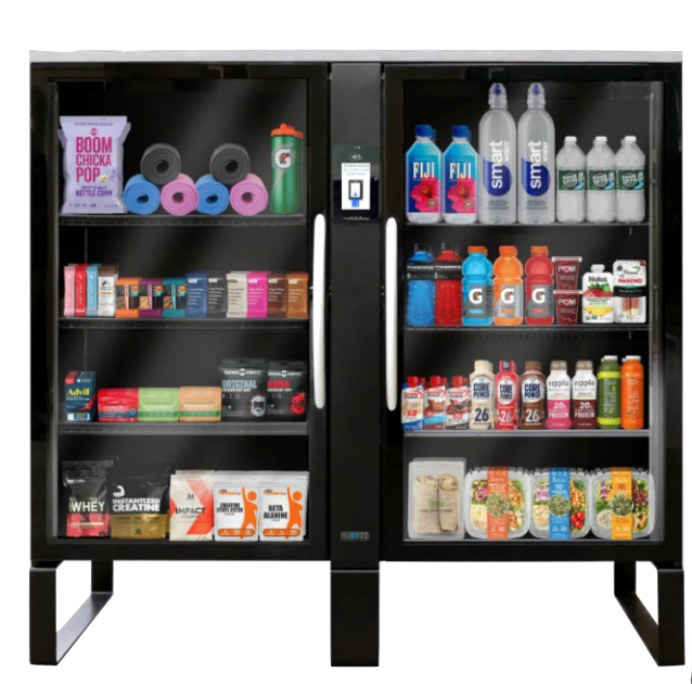A vending machine with fitness and hydration products, protein powders, supplements, energy drinks, bottled water, and snacks inside.