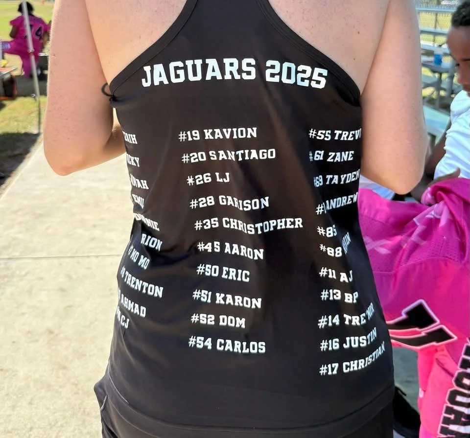 Black athletic jersey with white text listing team members' names and numbers, titled 'Jaguars 2025'.