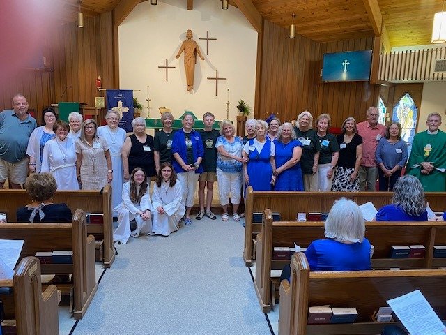 Volunteers were getting ready for 2026 Vacation Bible School Sunday, June 7, with Fr. Gary blessing them and a couple of friendly models wore the official T-shirts. Rev. Stephanie gave everyone the lowdown on what's happening this week.