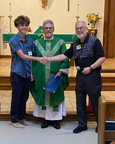 A Grace Church Scholarship was presented to Noah Jackson by Church Treasurer Gary Lincoln on Sunday, June 21. Noah, who graduated from Father Lopez Senior High School, is the son of Fr. Gary and Christina Jackson, and will be attending Daytona State 