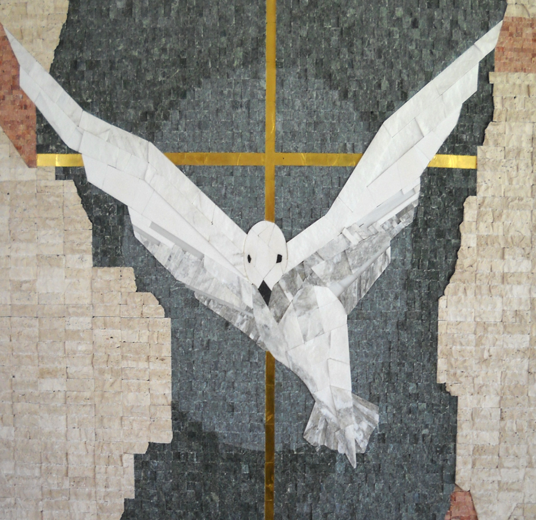 A mosaic wall art of a white bird, resembling a dove, with open wings, set against a background of various colored tiles and a gold cross.