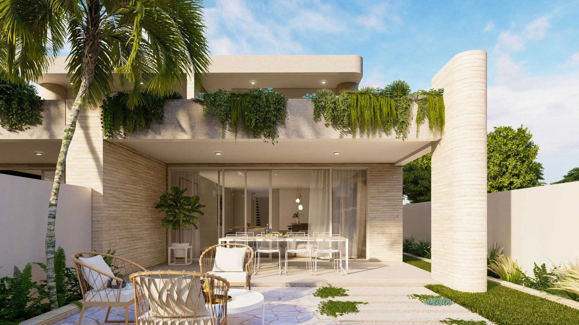 Modern outdoor patio area with dining table and chairs, seating with cushions, potted plants, and lush greenery on the building's upper level, under a blue sky with some clouds.