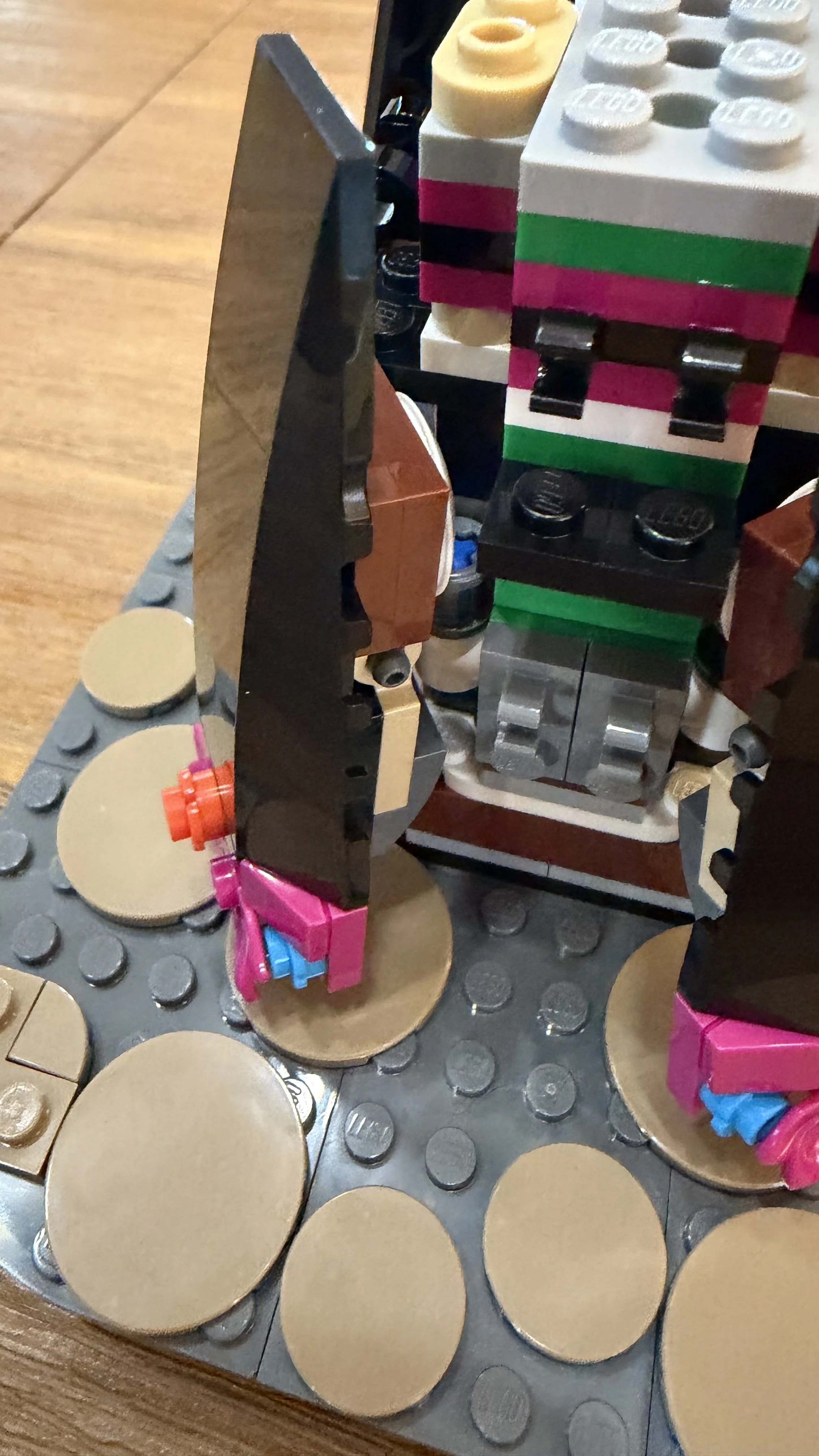 Close-up of a difficult LEGO La Catrina dress-panel connection during assembly