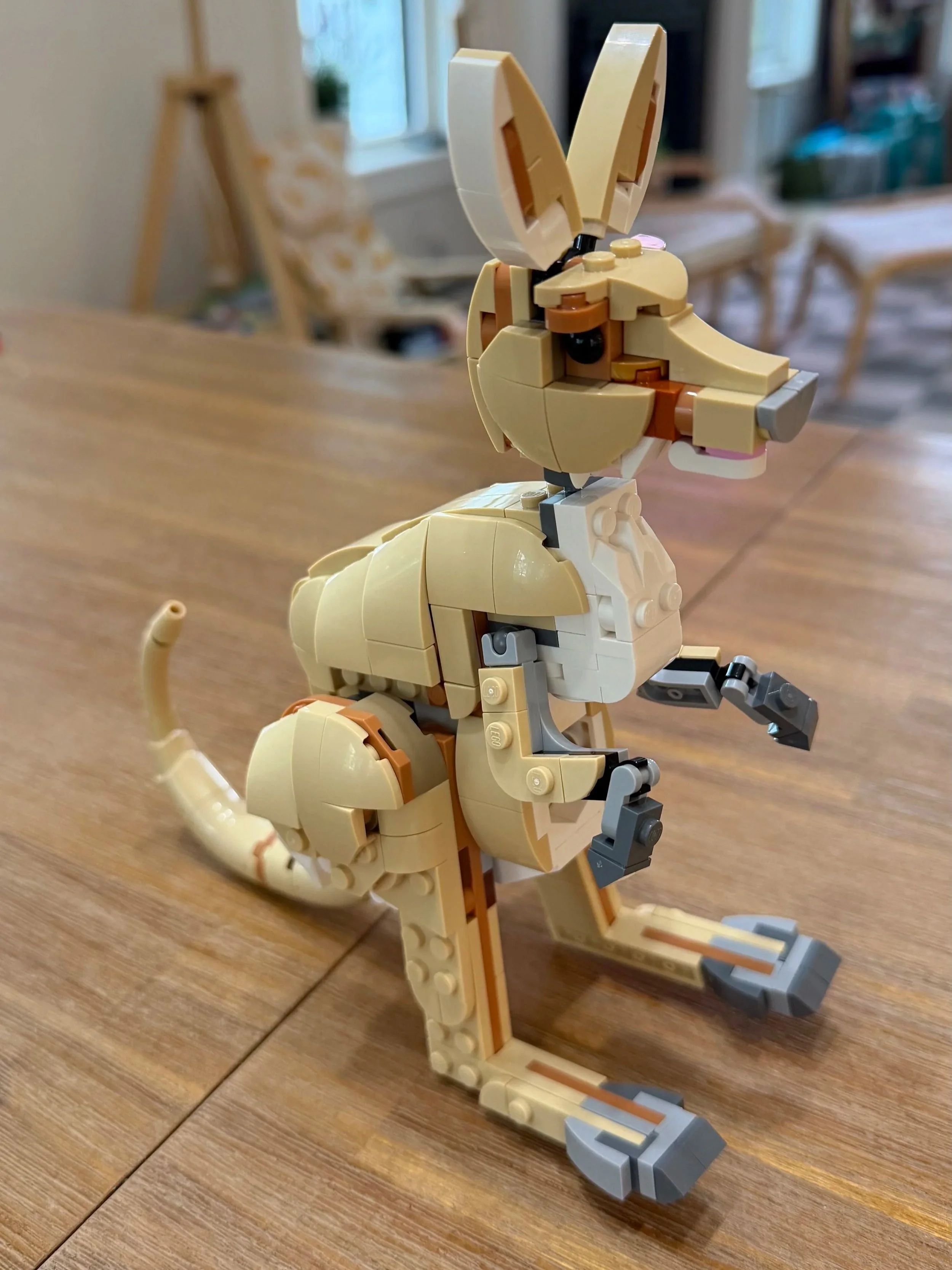Side view of the LEGO kangaroo showing the articulated legs, large tail and body shaping