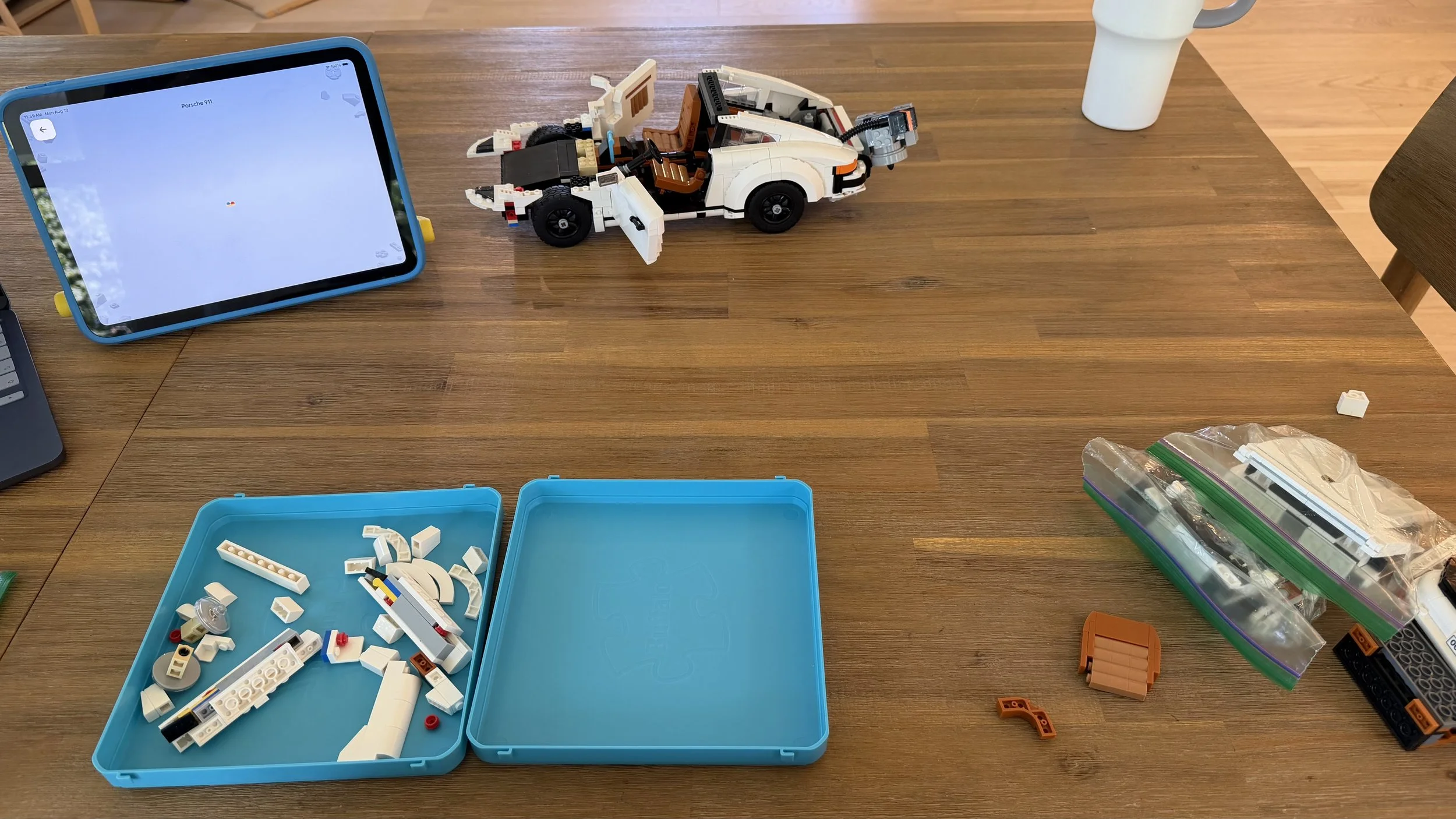 LEGO® pieces organized in sorting trays during a Bricksmith rebuilding project.