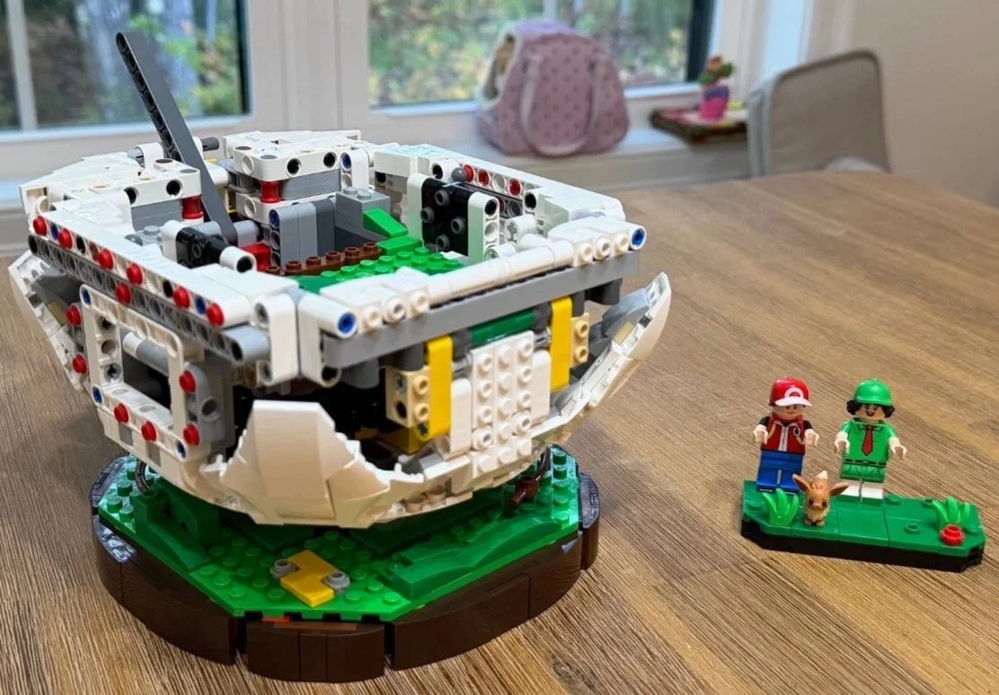 LEGO Poké Ball battle platform surrounded by reinforced Technic structure.