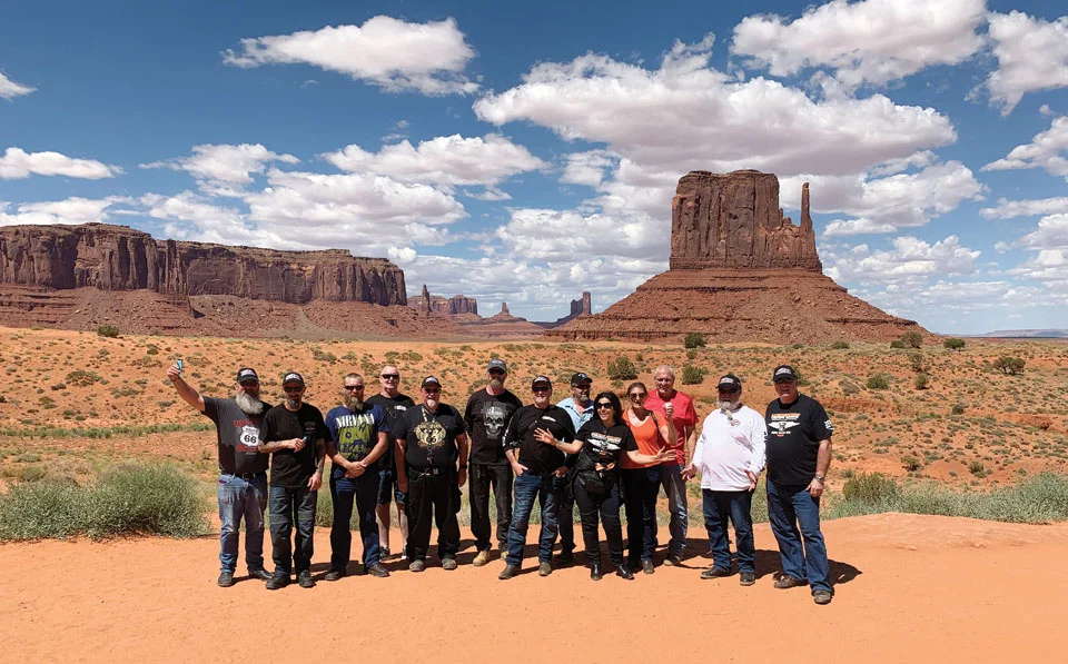 Behold! Monument Valley, a red-sand desert region on the Arizona-Utah border, known for its towering sandstone peaks.