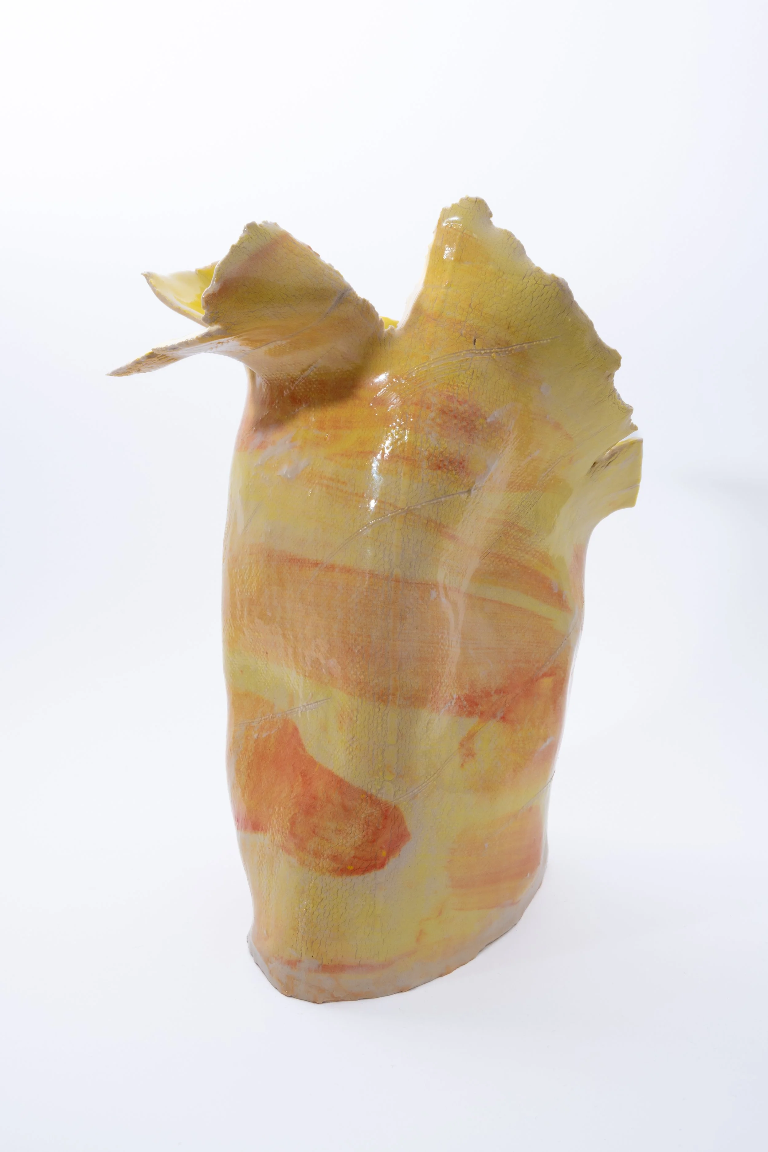 Large vase, play of yellow and orange, pushing clay and its natural boundaries, irregular shape.