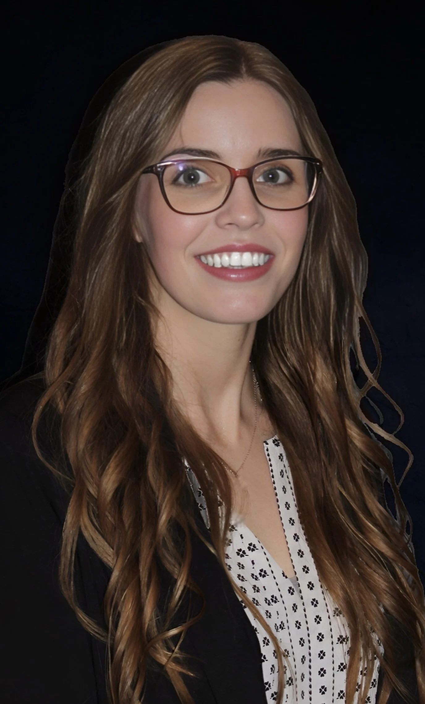 Illustration of a woman with long dark hair, smiling with eyes closed, wearing a red polka dot shirt and a colorful earring, against a pink background.