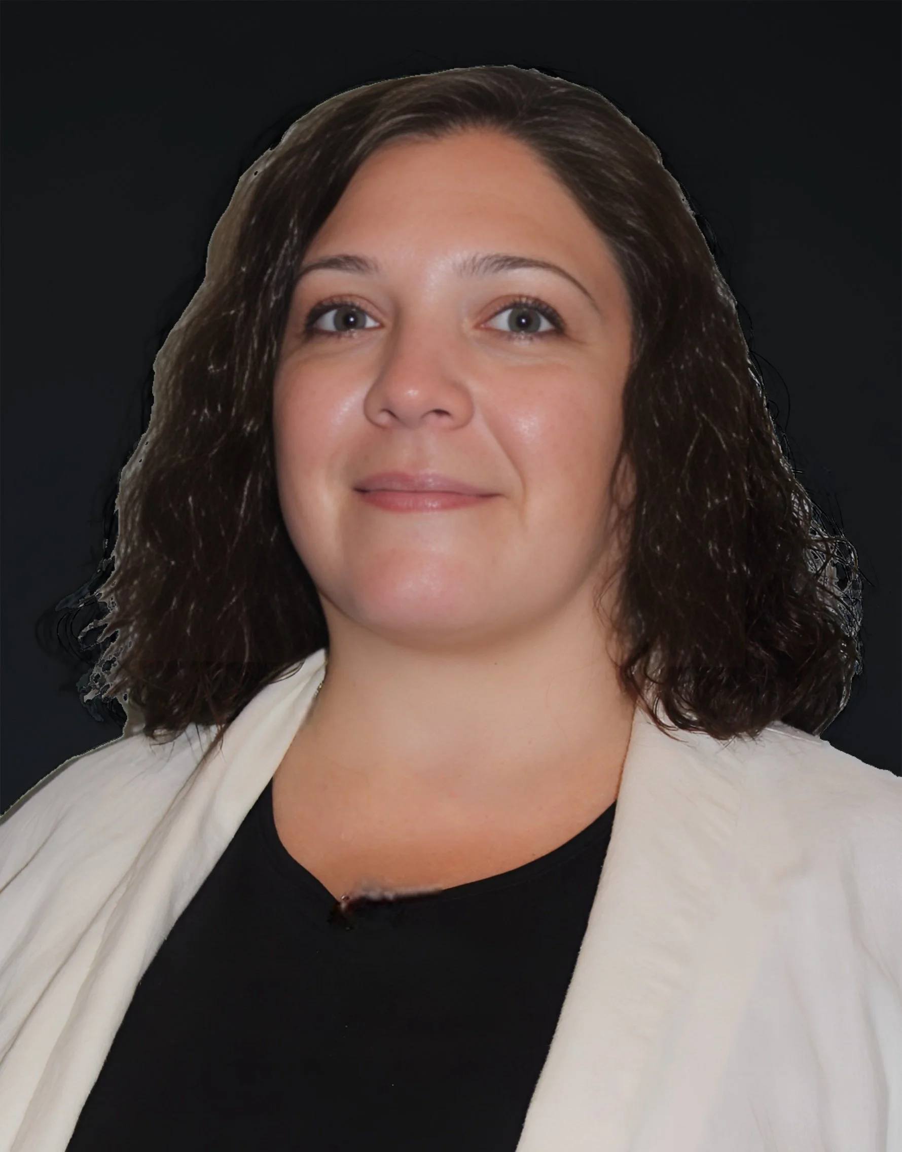 Image of a woman with shoulder-length dark brown hair, blue eyes, wearing a black top and cream blazer, against a black background.